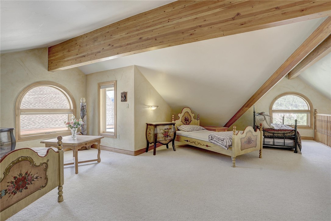137 Rasor Drive Keystone, CO 80435 - Photo 29 of 35 a bedroom with furniture and a large window