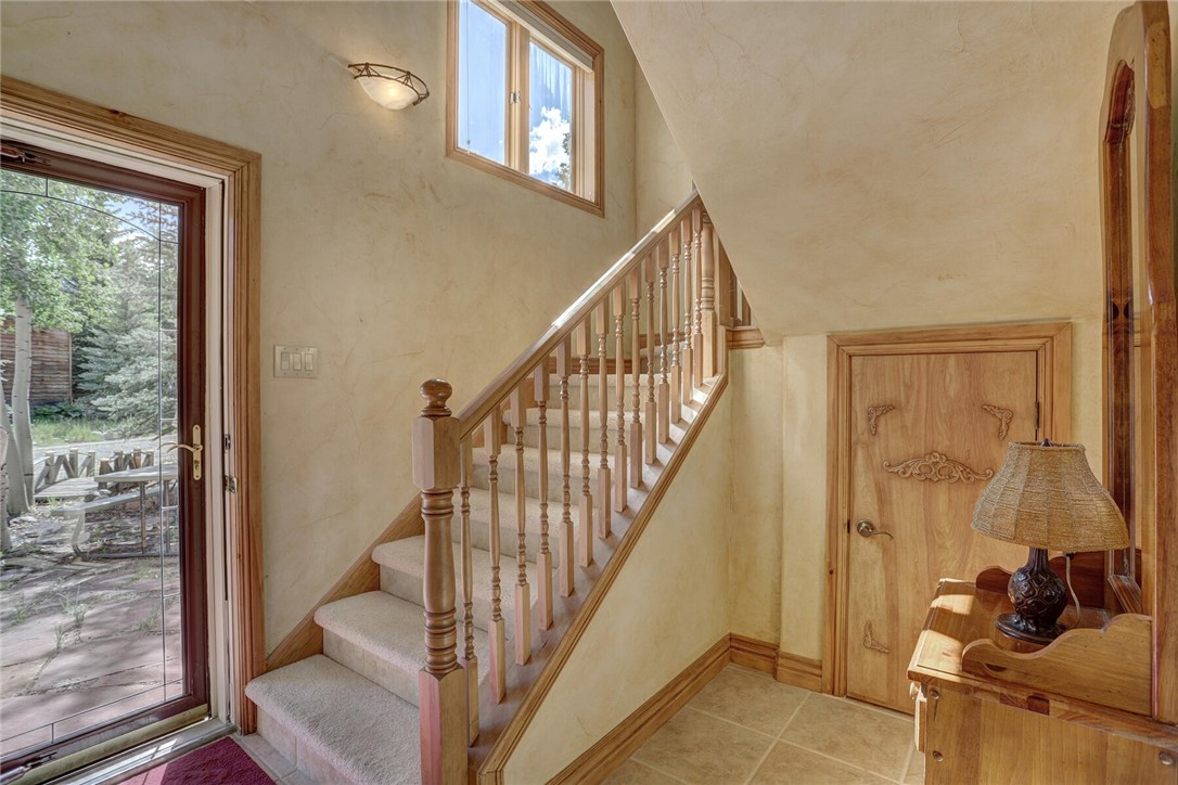 137 Rasor Drive Keystone, CO 80435 - Photo 30 of 35 a view of a hallway with wooden floor and entryway