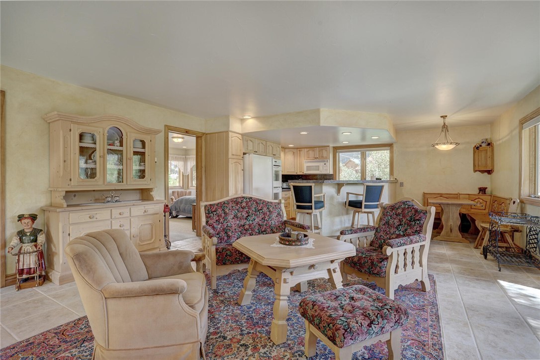 137 Rasor Drive Keystone, CO 80435 - Photo 5 of 35 a living room with fireplace furniture and a table