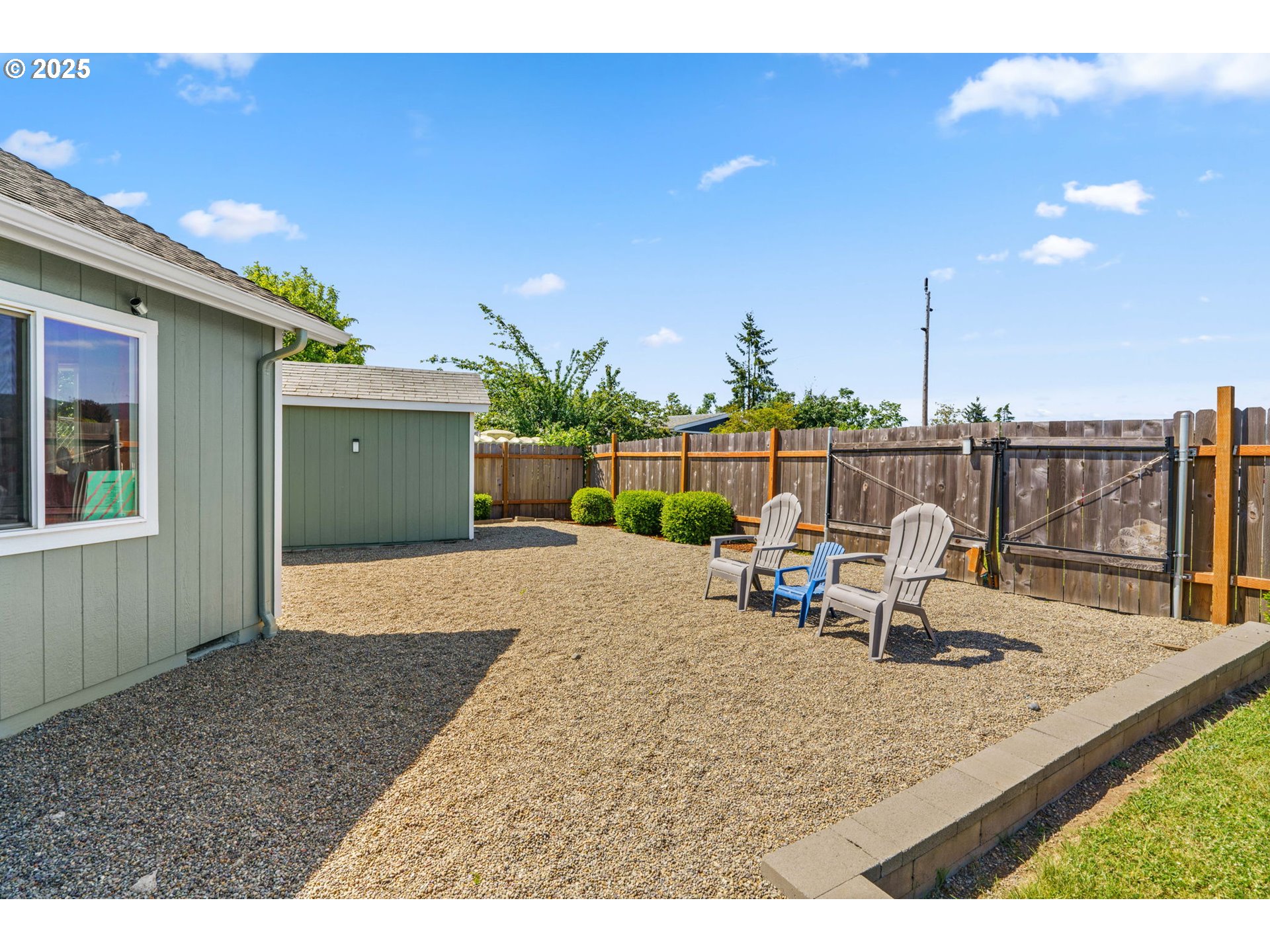 804 T Street Springfield, OR 97477 - Photo 33 of 45 a view of a patio with a table and chairs