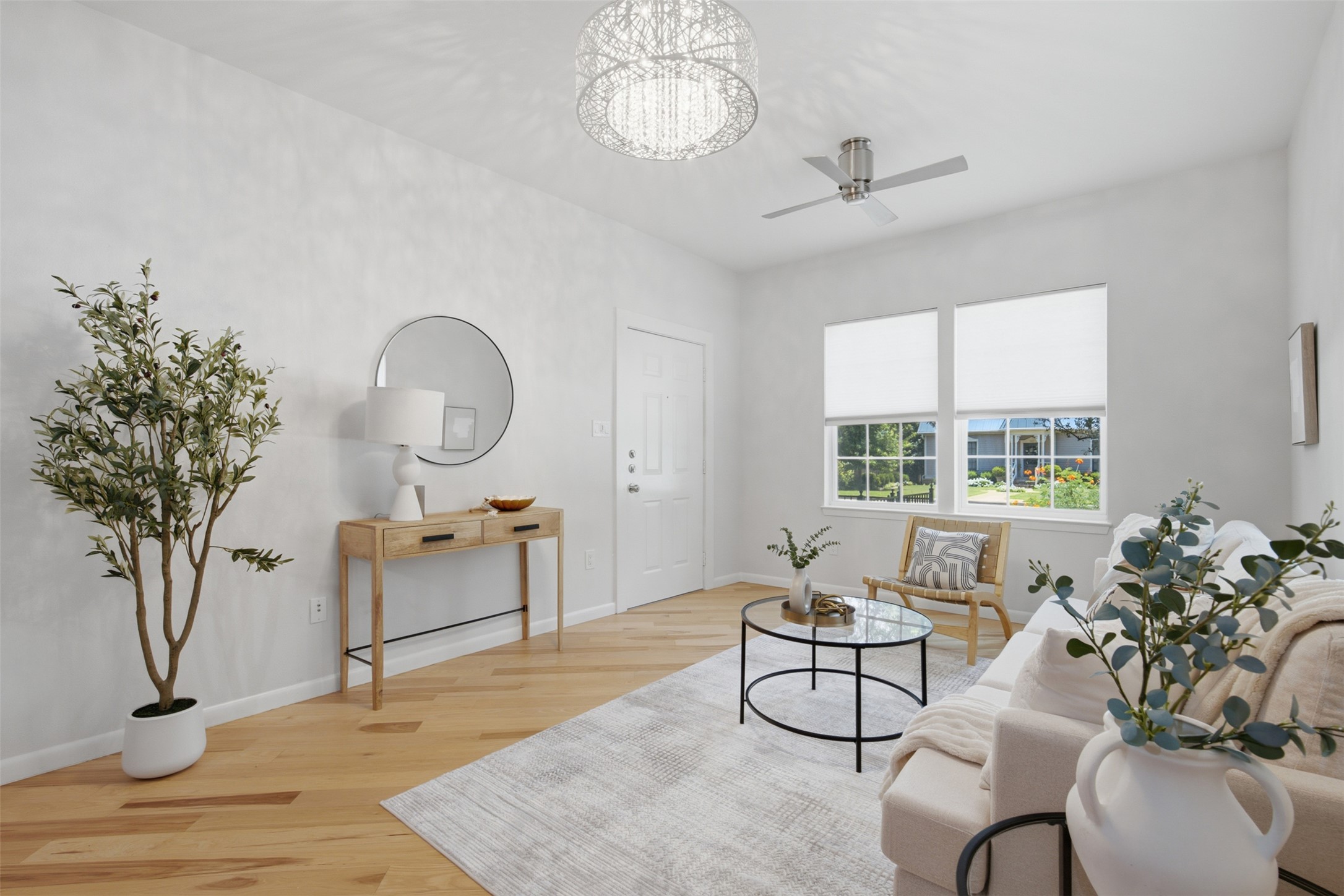 206 East 43rd Street Austin, TX 78751 - Photo 7 of 29 Gleaming hardwood flors and updated light fixtures welcome you into the home.