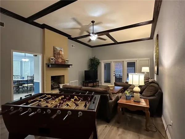a view of a livingroom with furniture and a fireplace