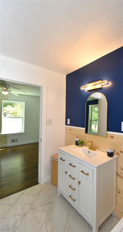 2030 Sanders Drive Austell, GA 30168 - Photo 24 of 42 a bathroom with a sink vanity and mirror