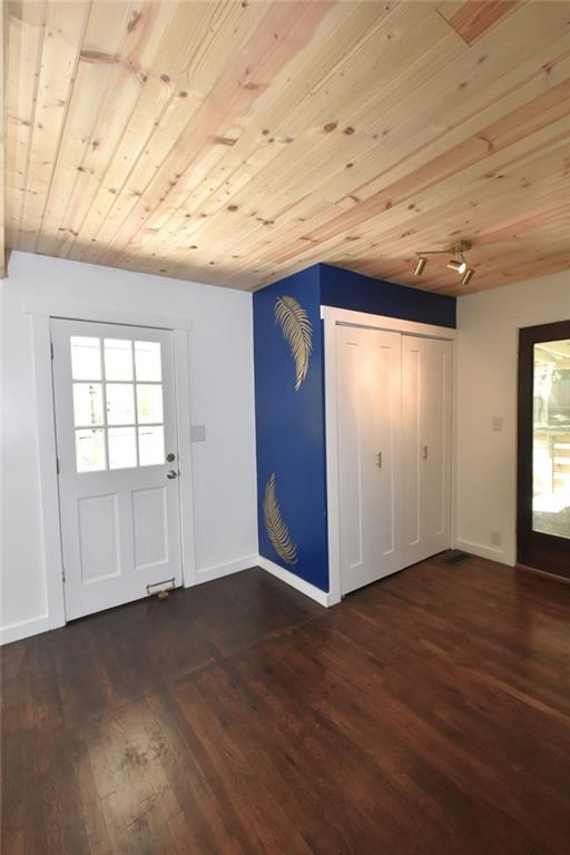 2030 Sanders Drive Austell, GA 30168 - Photo 29 of 42 an empty room with wooden floor and windows