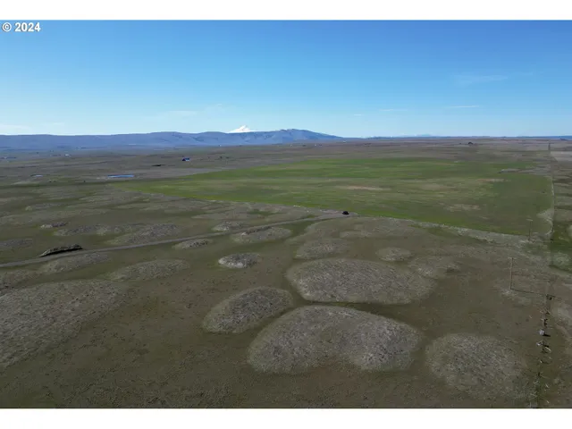 a view of an outdoor space and mountain view