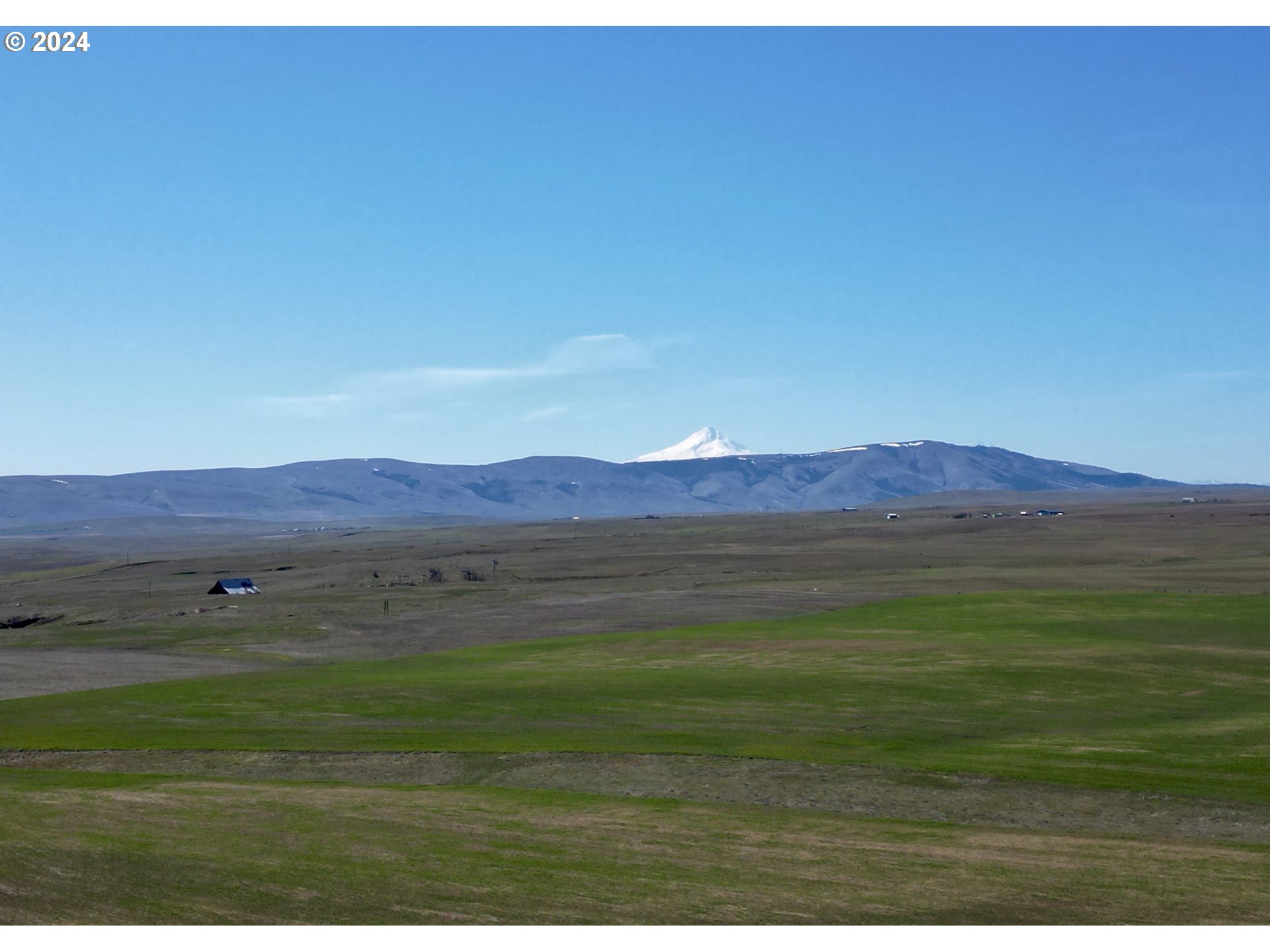 345 Erickson Road Centerville, WA 98613 - Photo 3 of 29 a view of an ocean and mountains