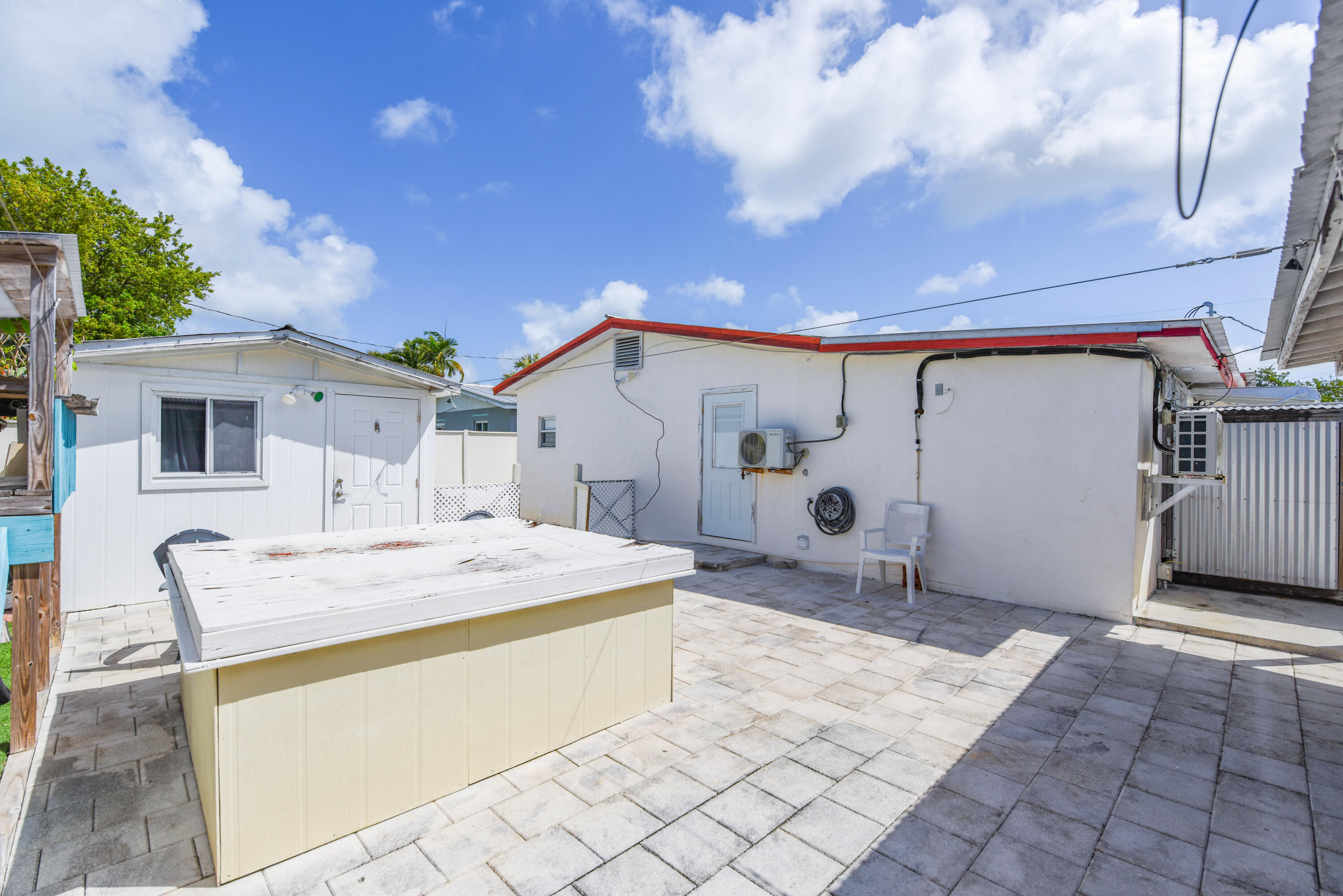 1524 5th Street Key West, FL 33040 - Photo 31 of 31 a spacious bathroom with a granite countertop sink and a mirror