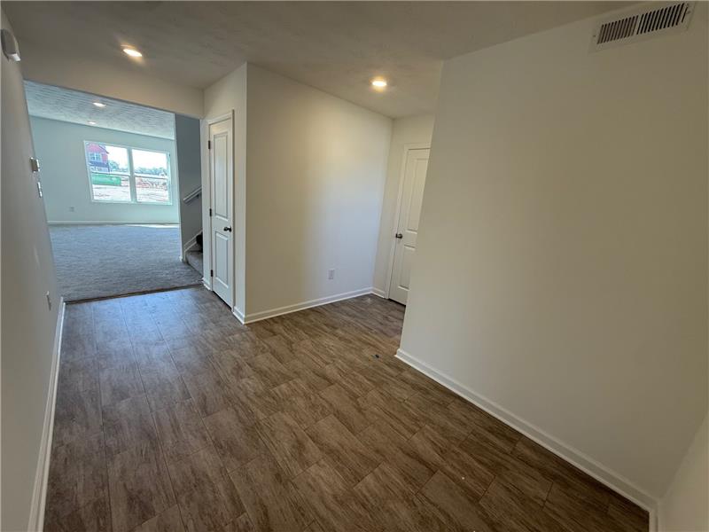 4005 Chakeres Avenue Springfield, OH 45505 - Photo 2 of 19 This inviting entryway leads into a spacious living area, setting a welcoming tone.