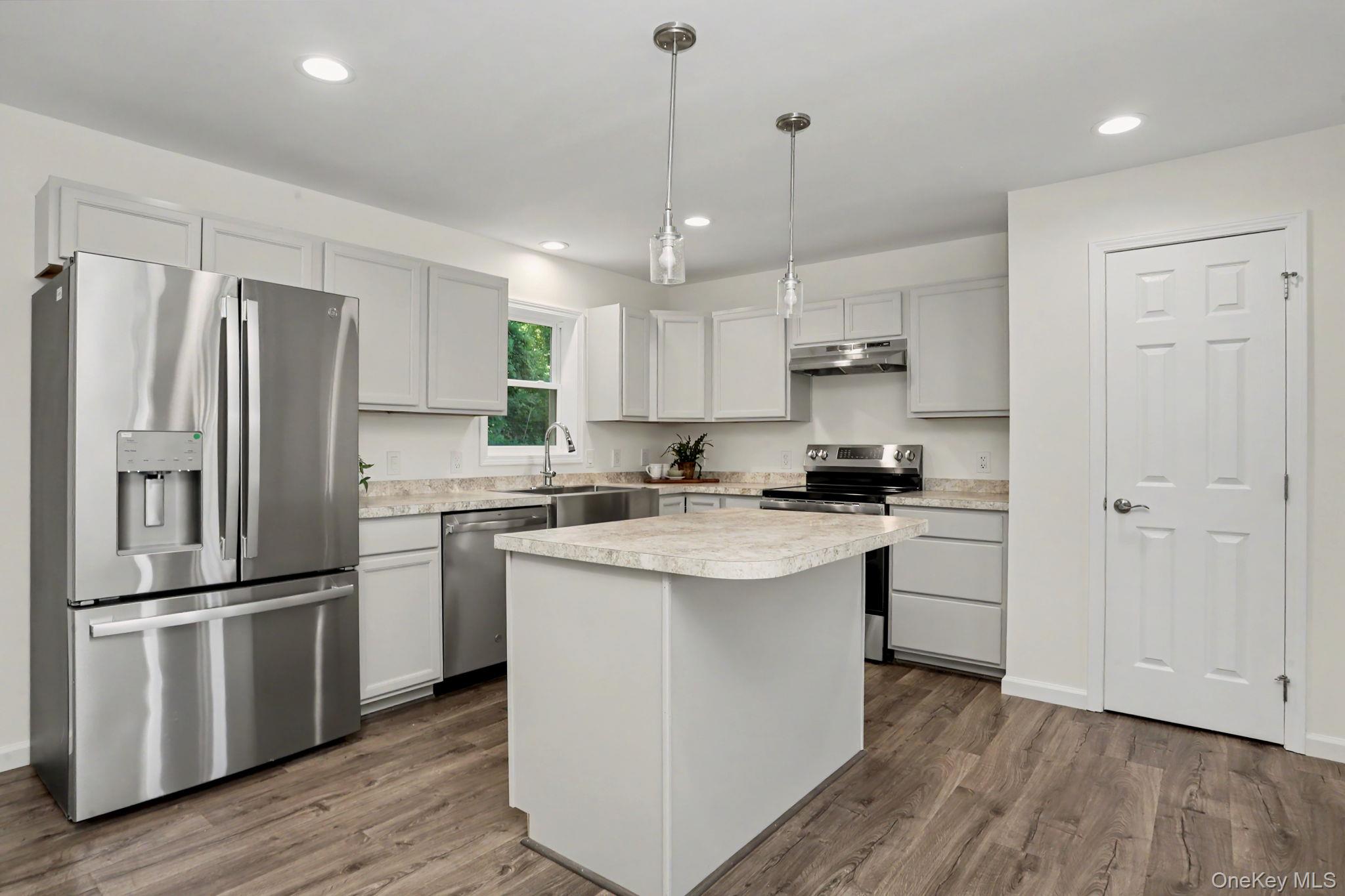 32 Spruce Road Brewster, NY 10509 - Photo 3 of 21 Kitchen with stainless steel appliances and pantry closet