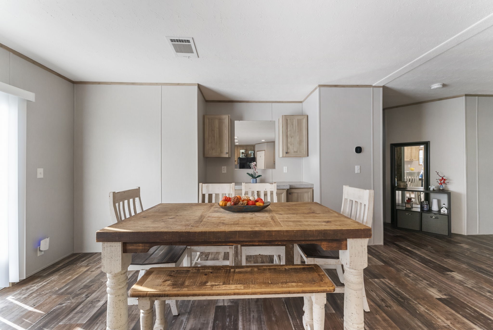 6913 Fm 3081 Road Willis, TX 77378 - Photo 12 of 46 a view of a dining room with furniture and wooden floor
