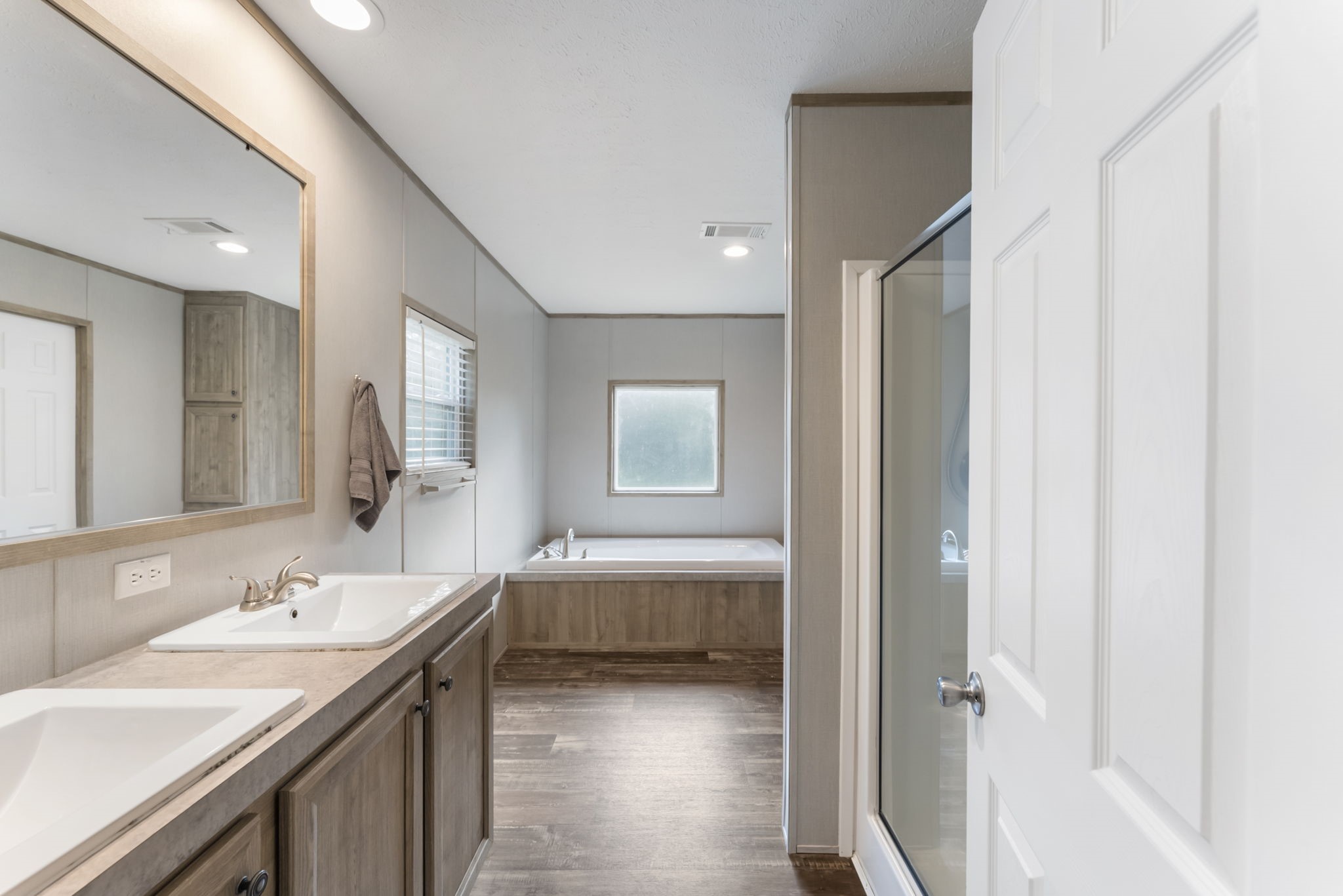 6913 Fm 3081 Road Willis, TX 77378 - Photo 16 of 46 a bathroom with a sink and a mirror