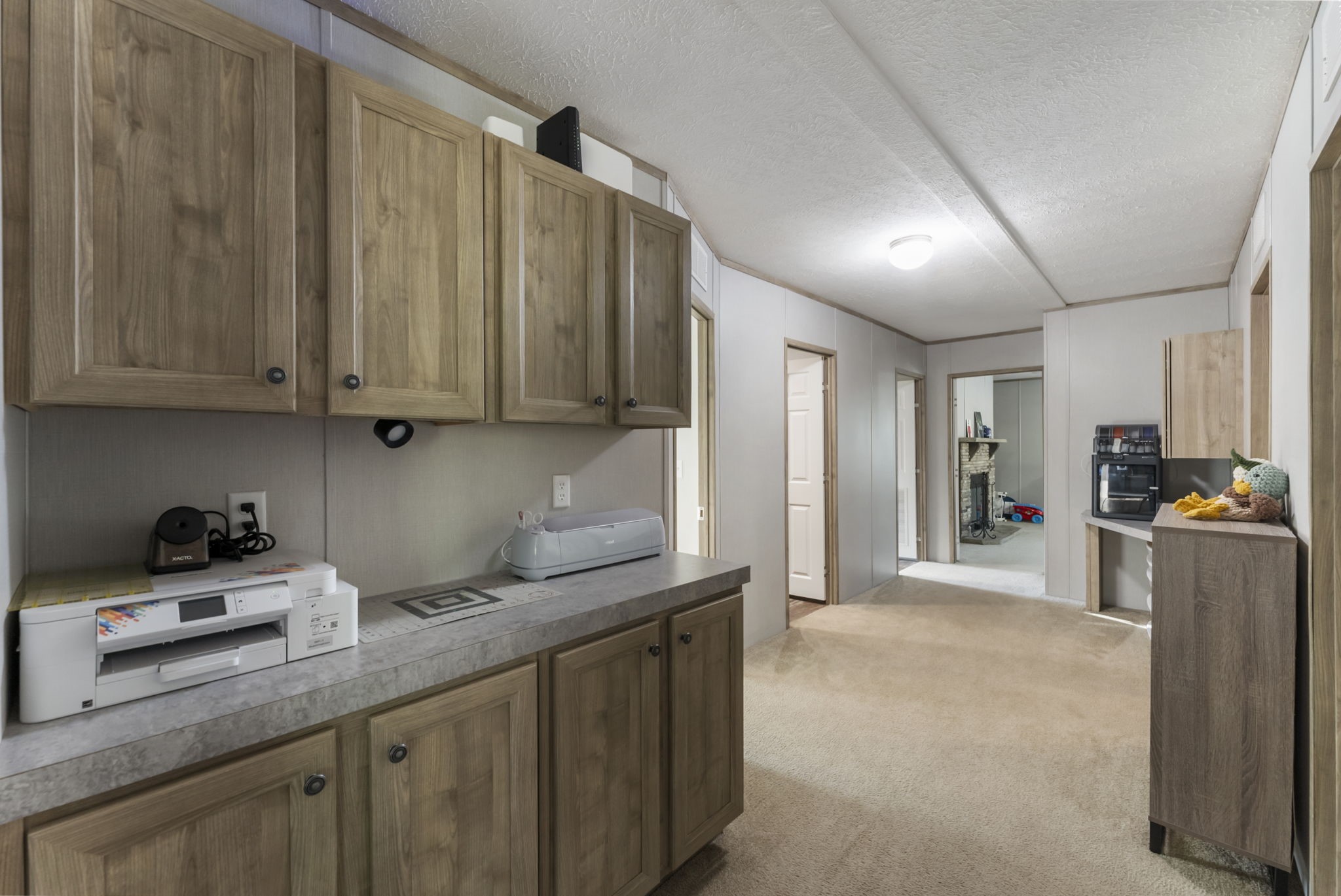 6913 Fm 3081 Road Willis, TX 77378 - Photo 26 of 46 a view of a kitchen with refrigerator and a sink