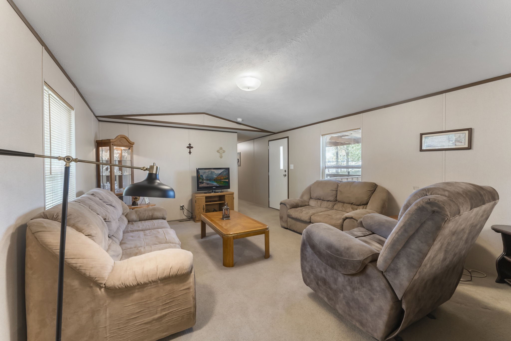 6913 Fm 3081 Road Willis, TX 77378 - Photo 32 of 46 a living room with furniture