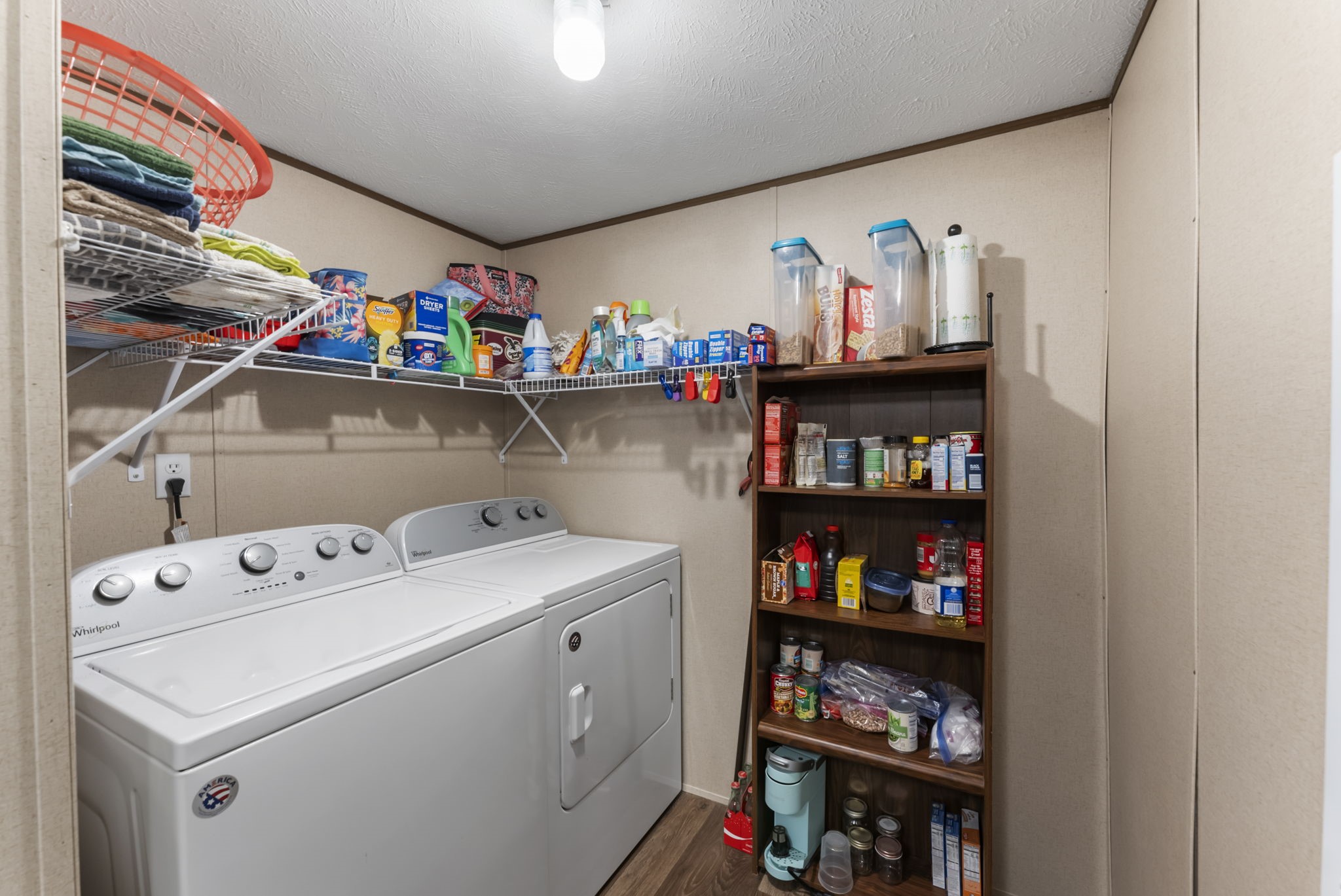 6913 Fm 3081 Road Willis, TX 77378 - Photo 37 of 46 a room with storage and utility