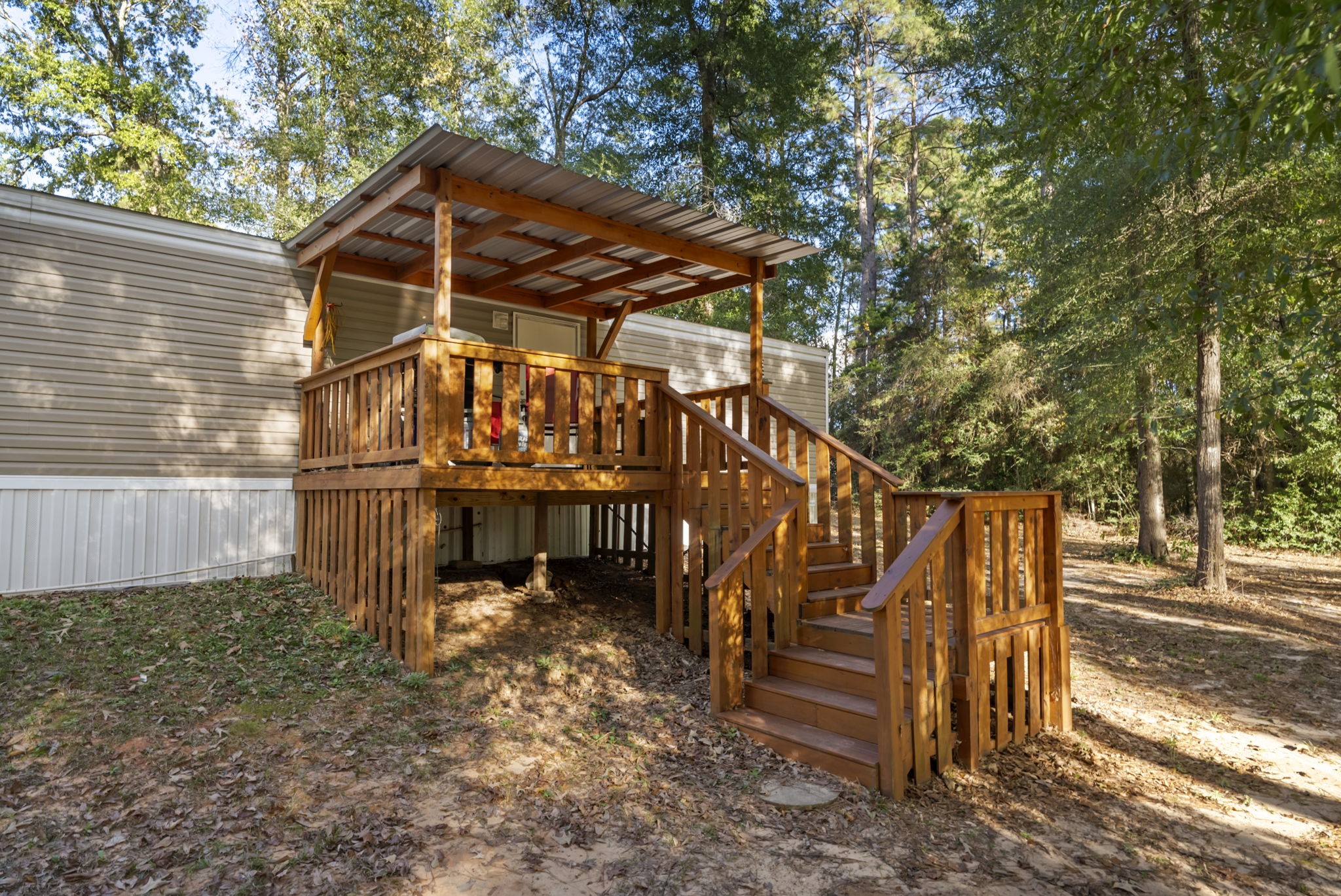 6913 Fm 3081 Road Willis, TX 77378 - Photo 42 of 46 a view of a house with backyard and wooden fence