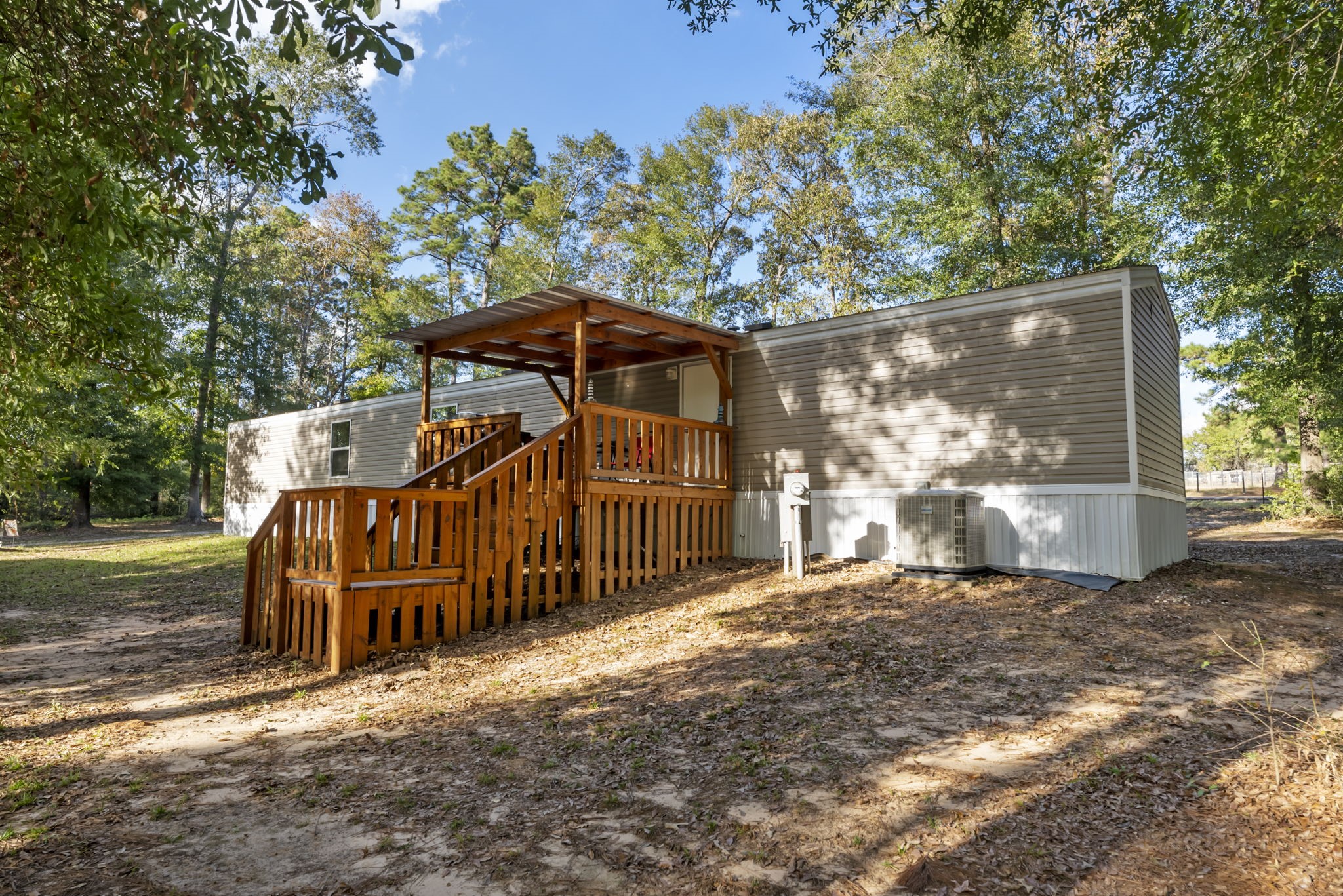 6913 Fm 3081 Road Willis, TX 77378 - Photo 43 of 46 a view of a house with a yard
