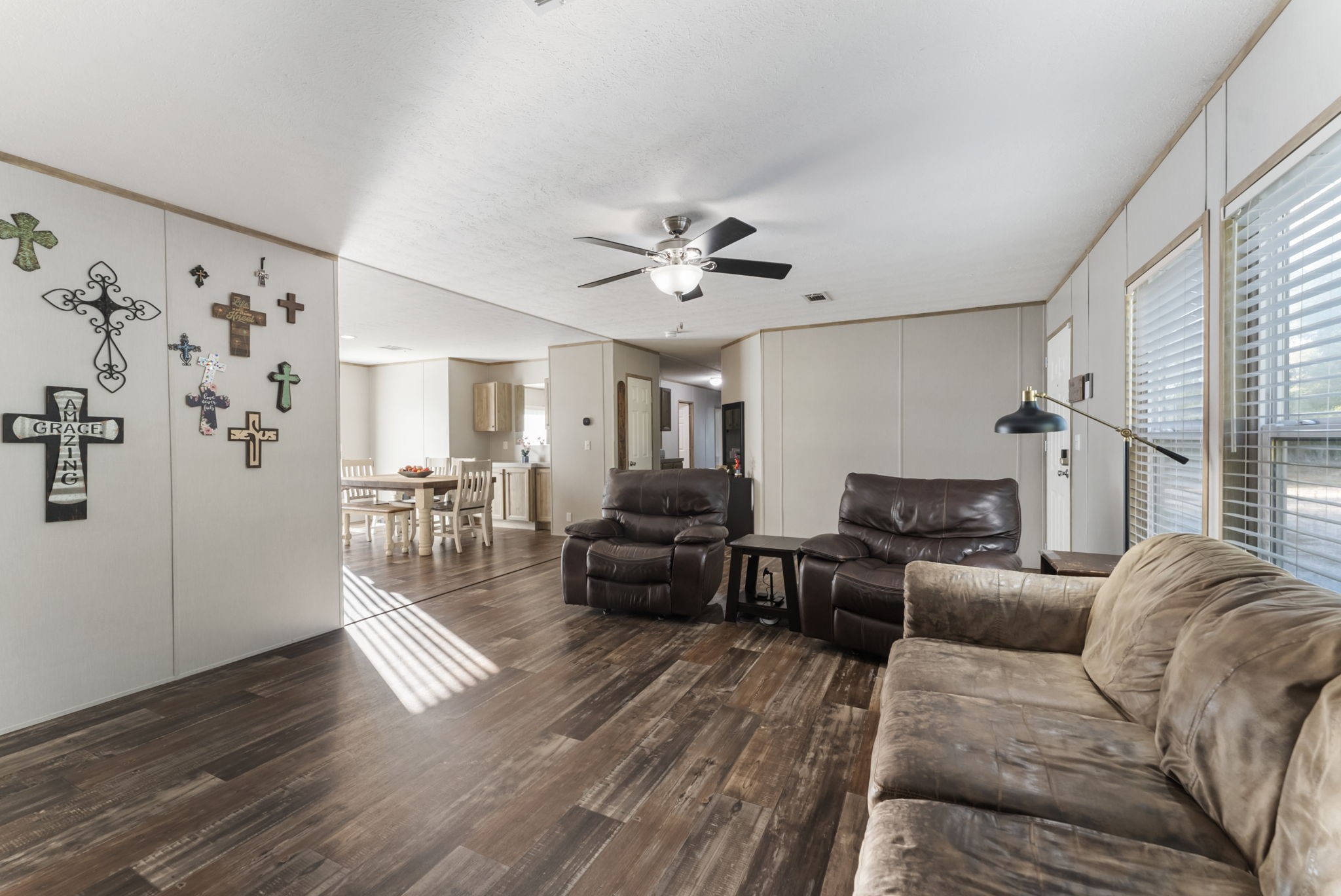 6913 Fm 3081 Road Willis, TX 77378 - Photo 9 of 46 a living room with furniture and a fireplace
