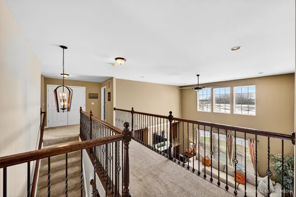 a view of a hallway with windows