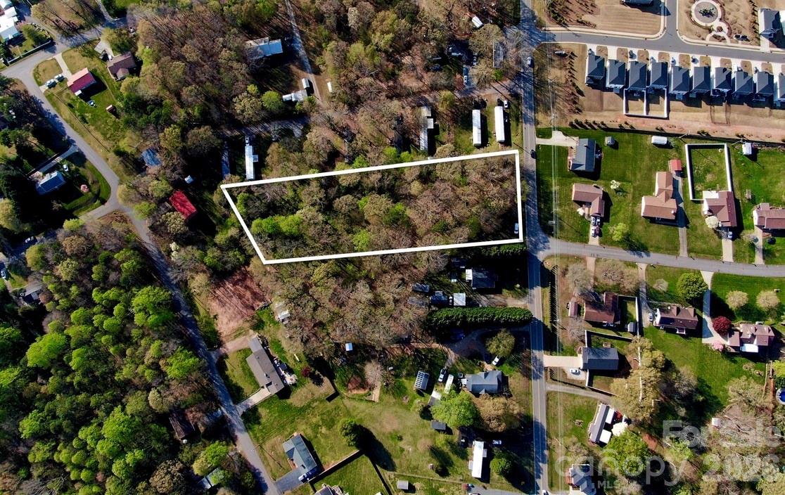 0 Spencer Road Northeast Hickory, NC 28601 - Photo 6 of 24 a view of city with the shops and fruits