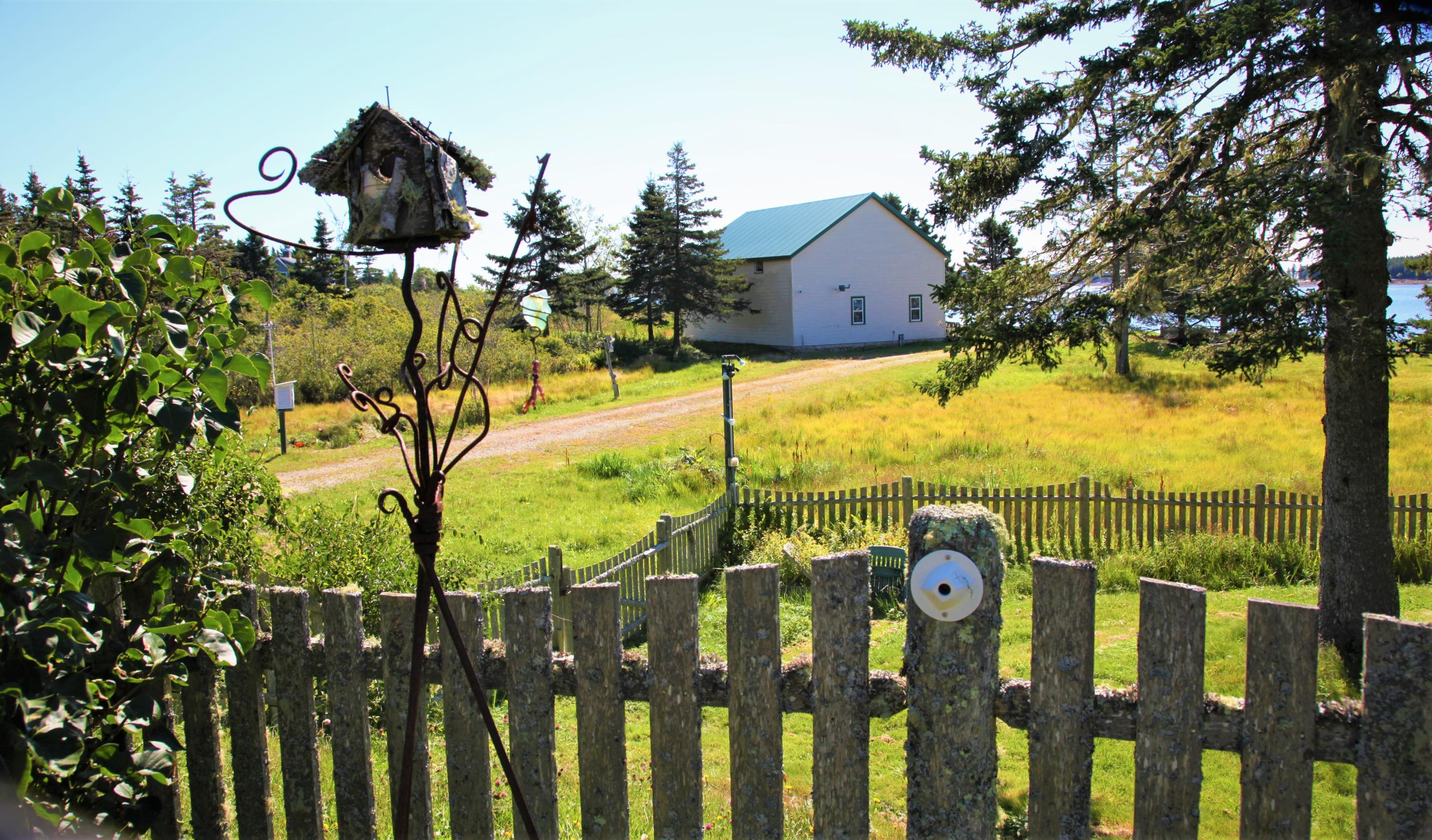 20 Campground Road Jonesport, ME 04649 - Photo 20 of 60 Views in Perennial garden to barn