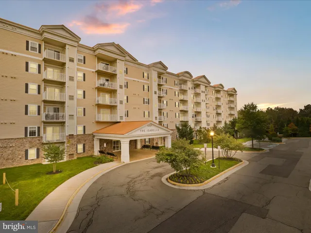 a front view of a building with outdoor space