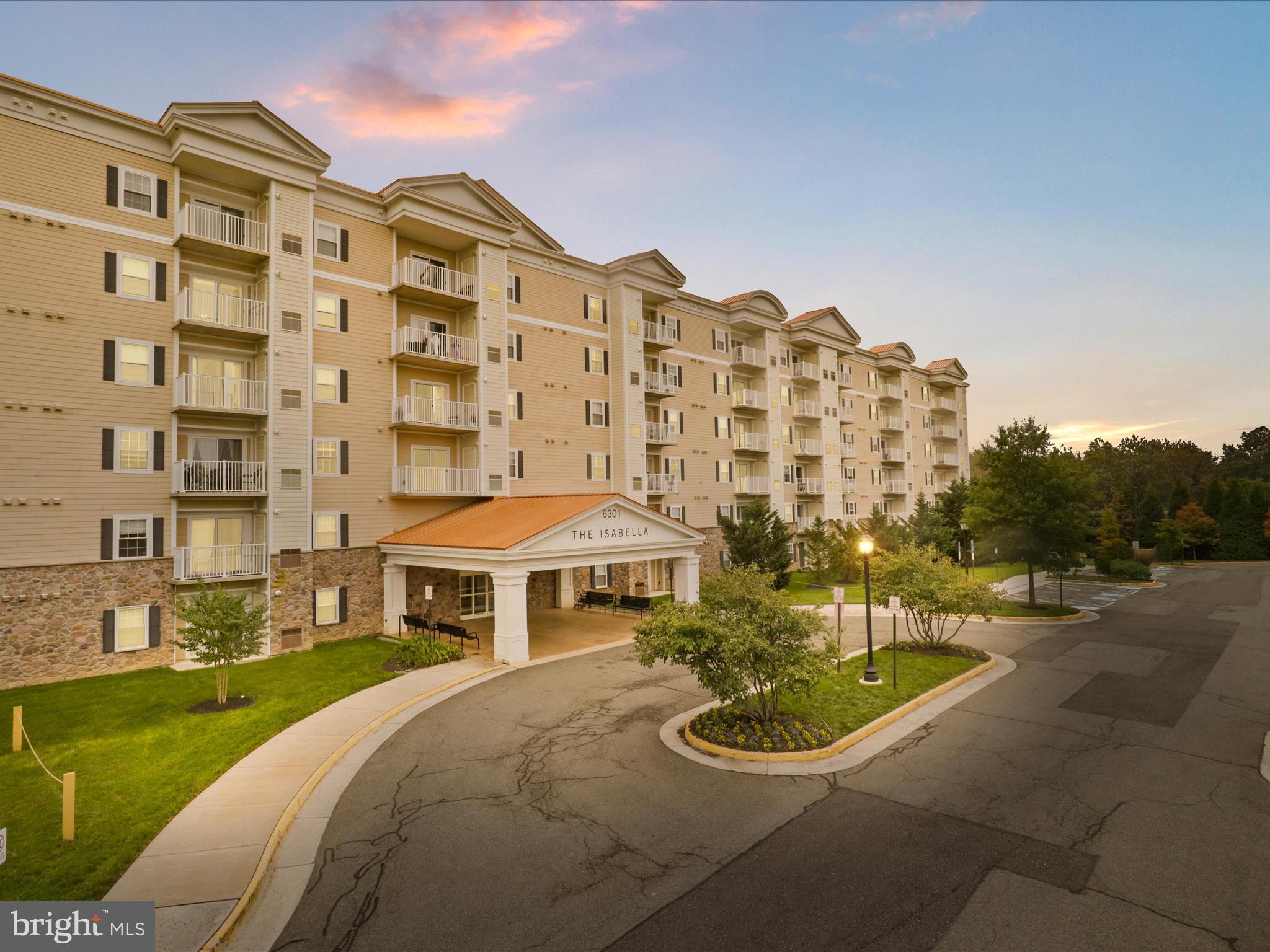 a front view of a building with outdoor space