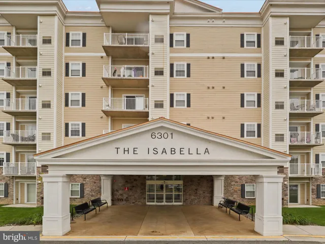 a view of a building with retail shops