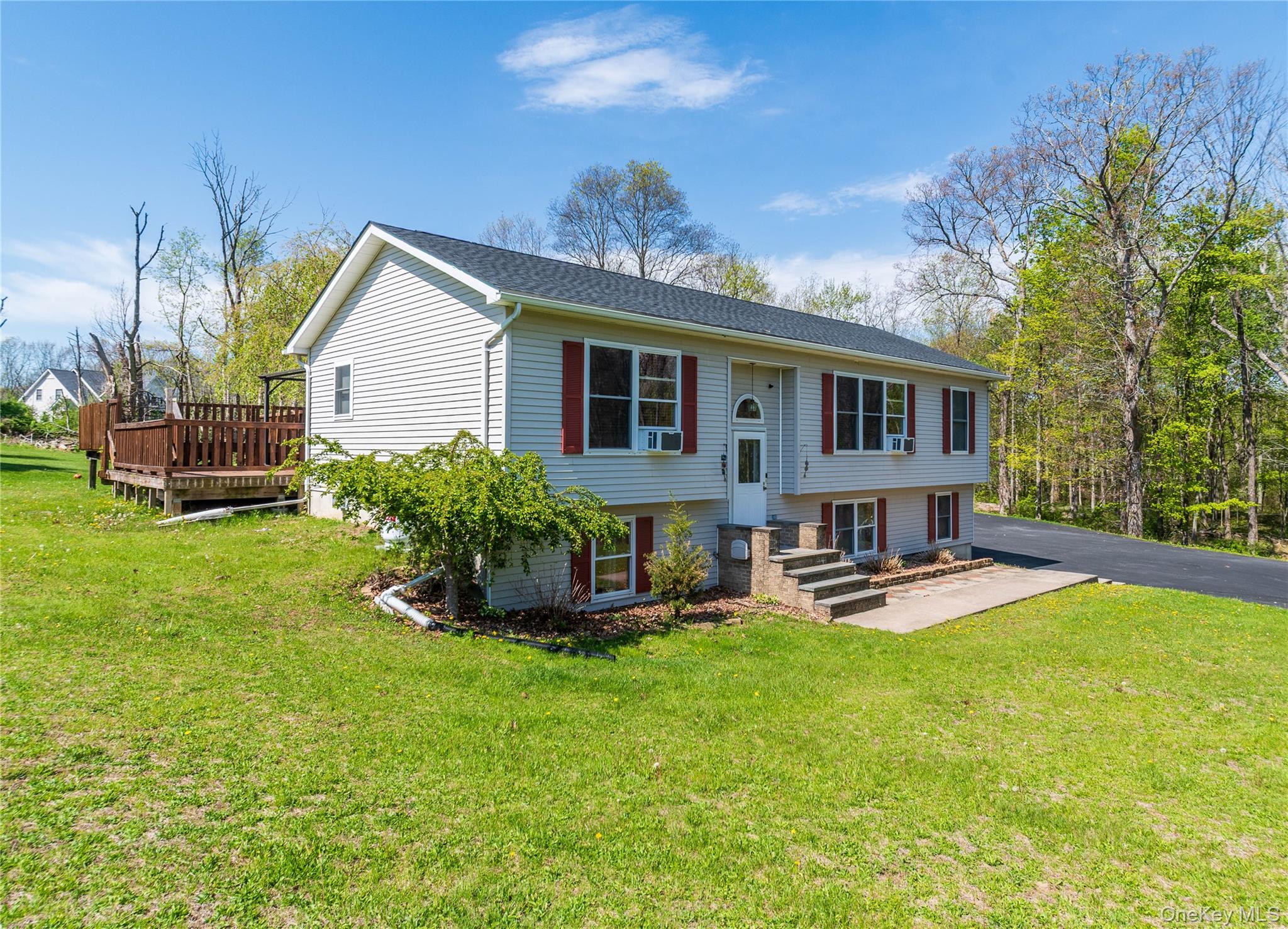 29 Murray Road Middletown, NY 10940 - Photo 18 of 24 a view of a house with a yard patio and fire pit