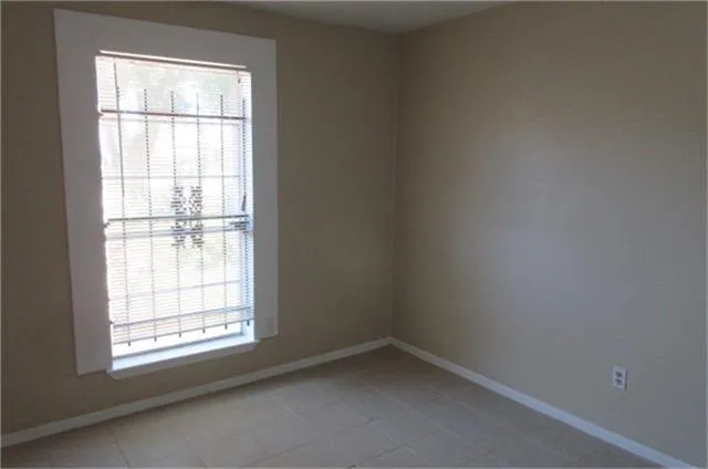 an empty room with a window