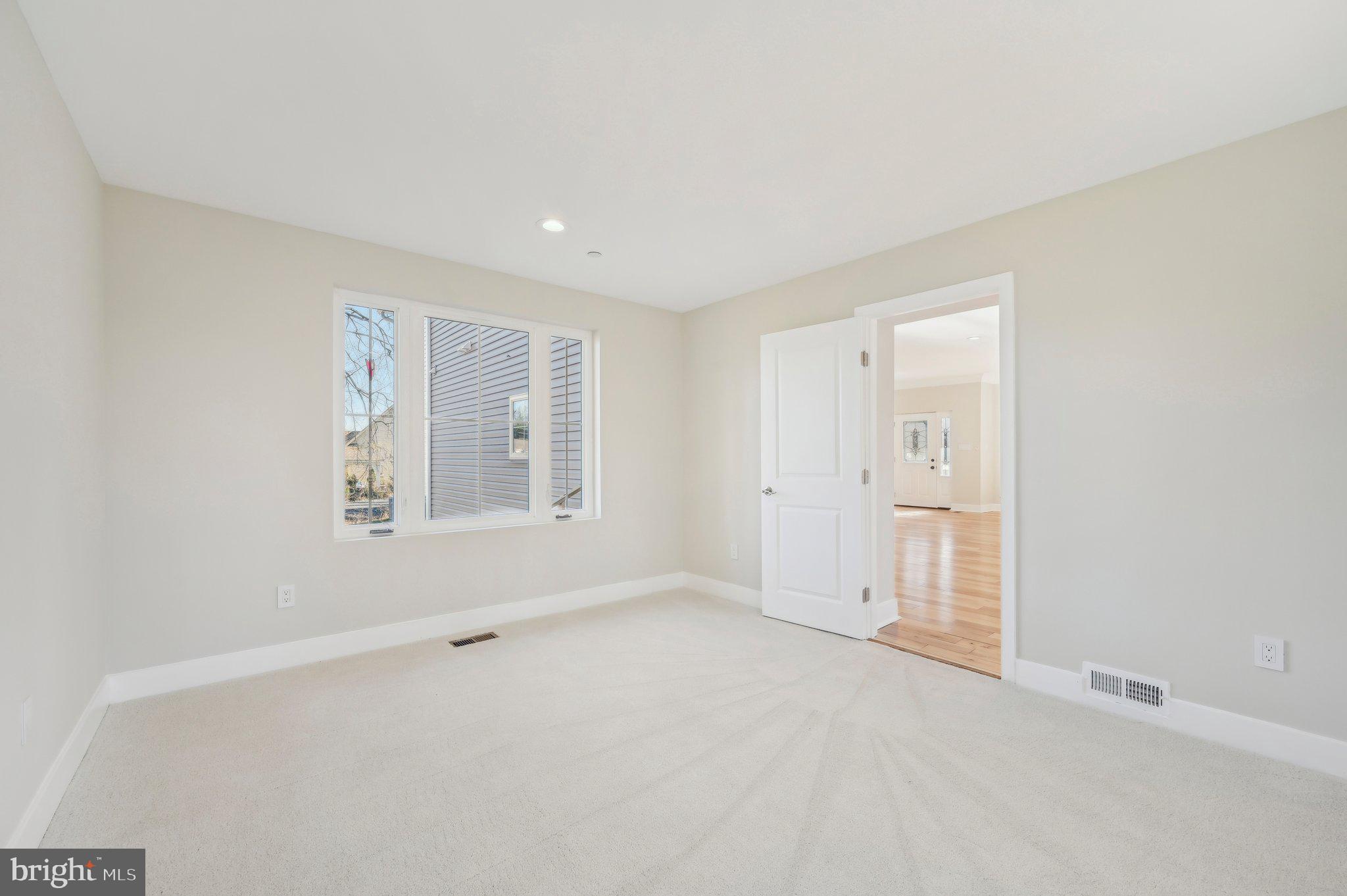 11990 Hall Shop Road Clarksville, MD 21029 - Photo 21 of 64 an empty room with windows and closet