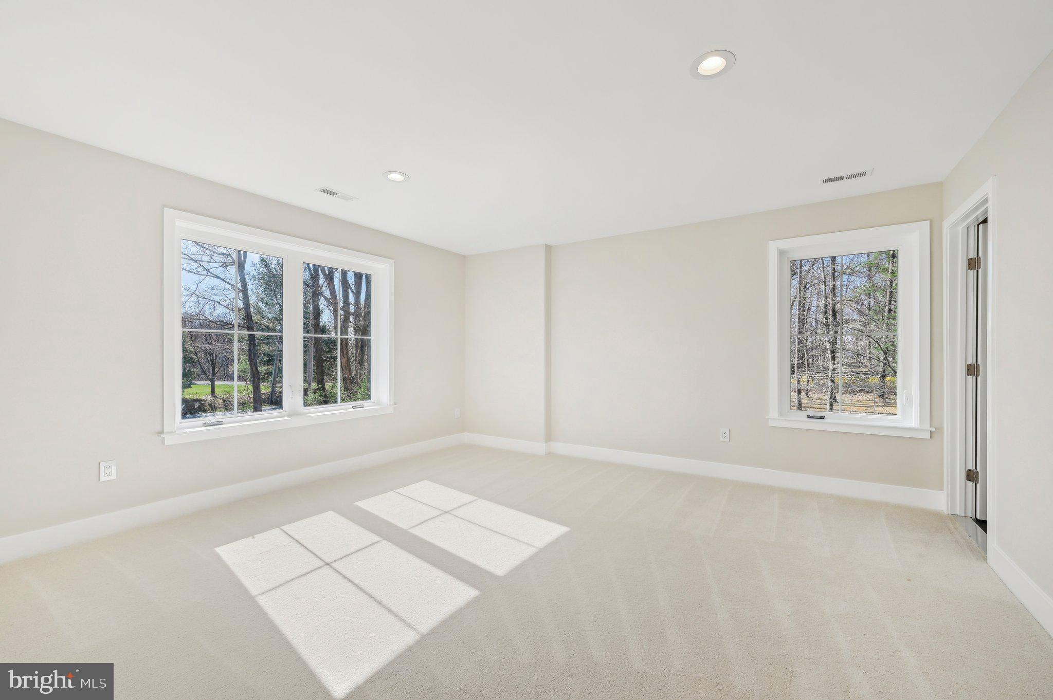 11990 Hall Shop Road Clarksville, MD 21029 - Photo 28 of 64 an empty room with windows