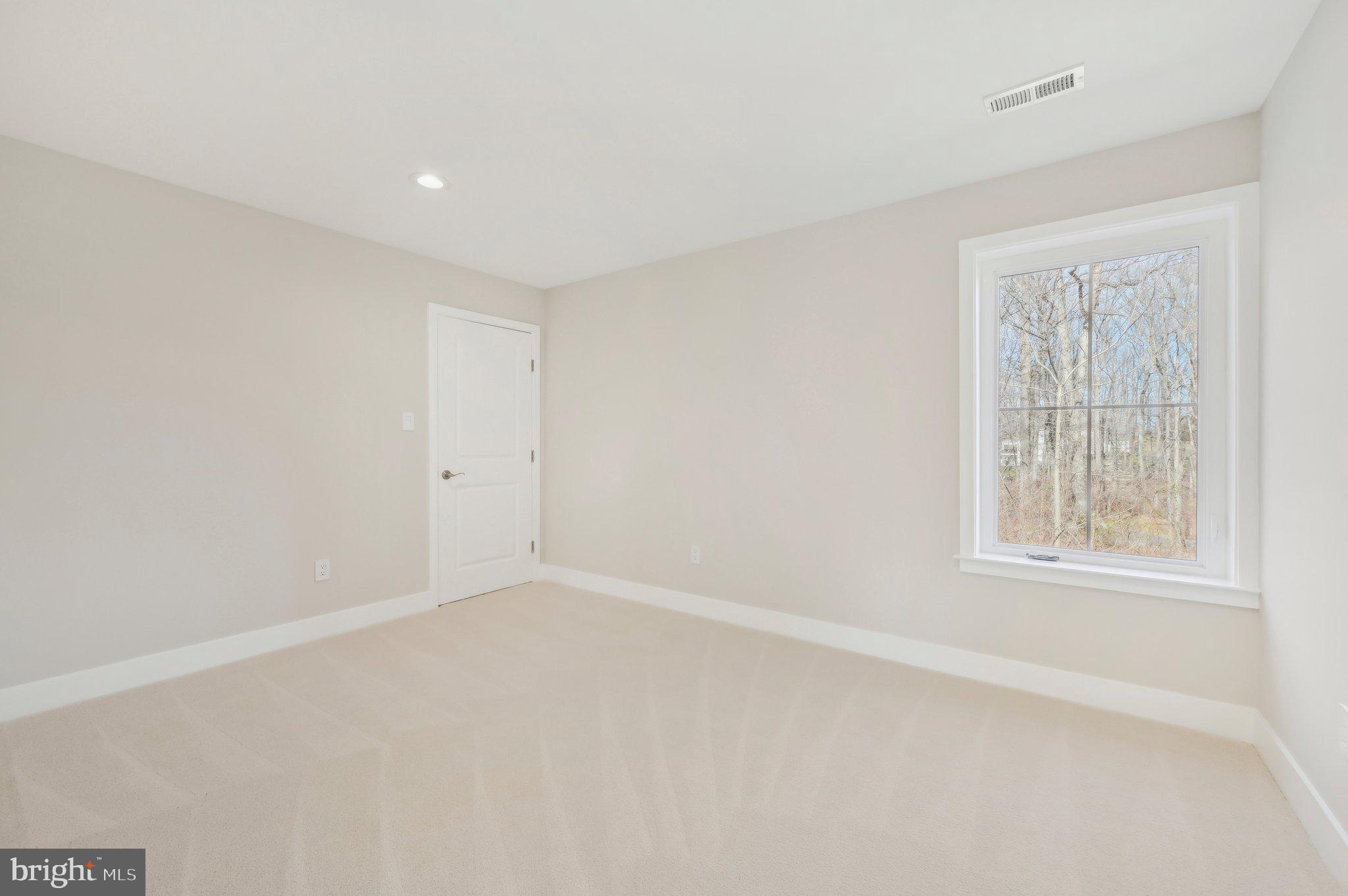 11990 Hall Shop Road Clarksville, MD 21029 - Photo 34 of 64 an empty room with a window