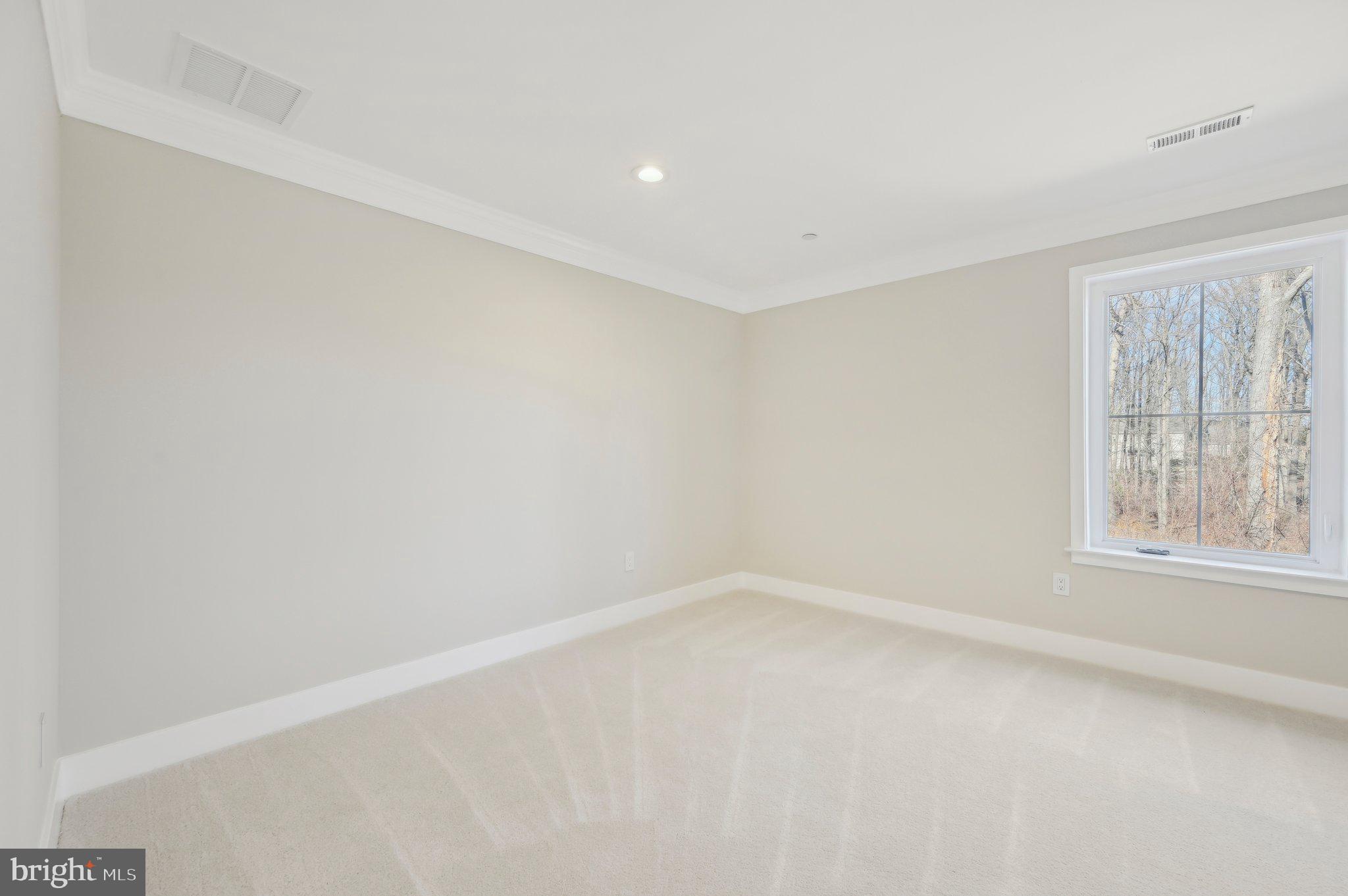 11990 Hall Shop Road Clarksville, MD 21029 - Photo 39 of 64 a view of an empty room with a window