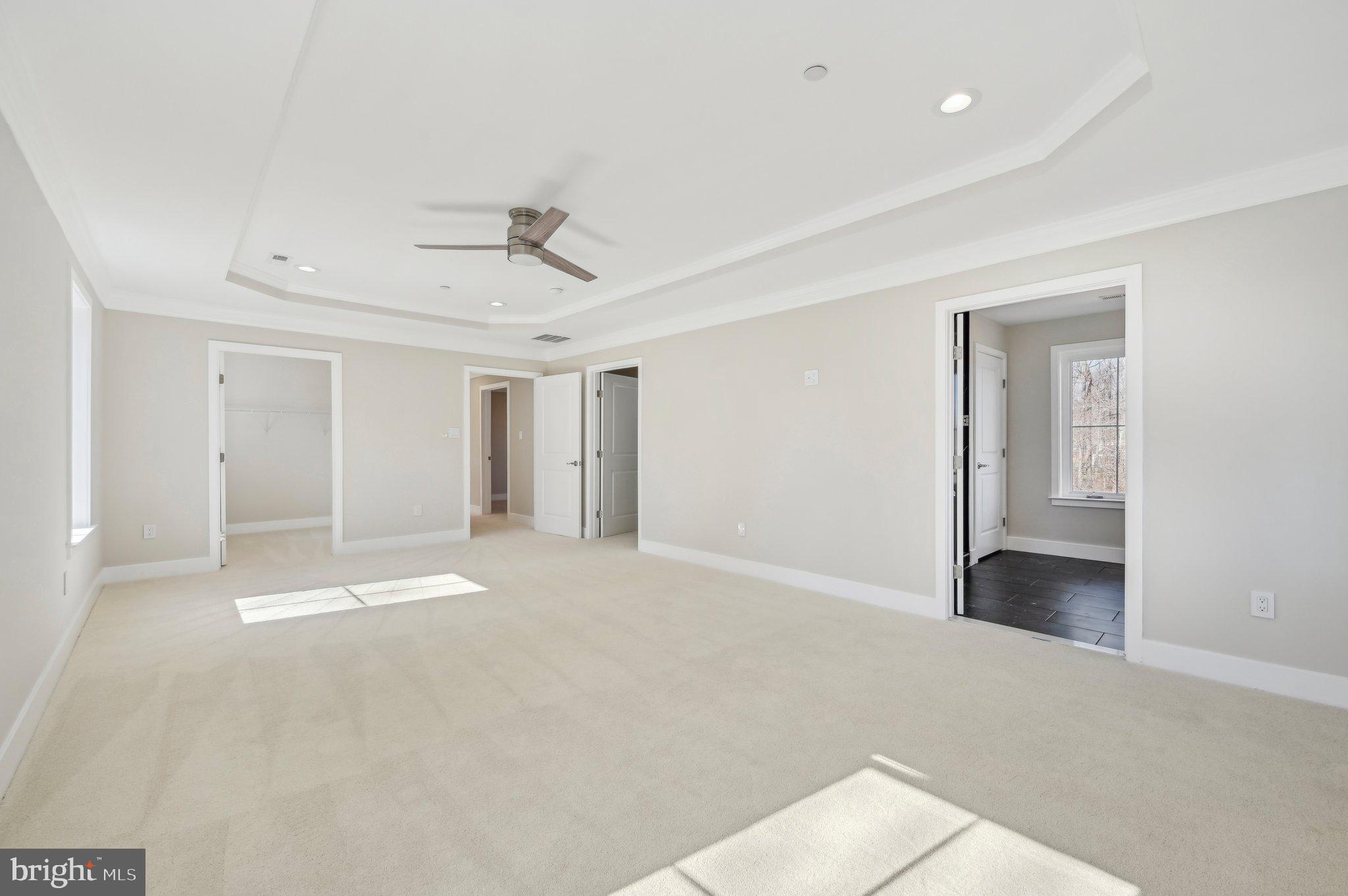 11990 Hall Shop Road Clarksville, MD 21029 - Photo 44 of 64 a view of an empty room with a ceiling fan