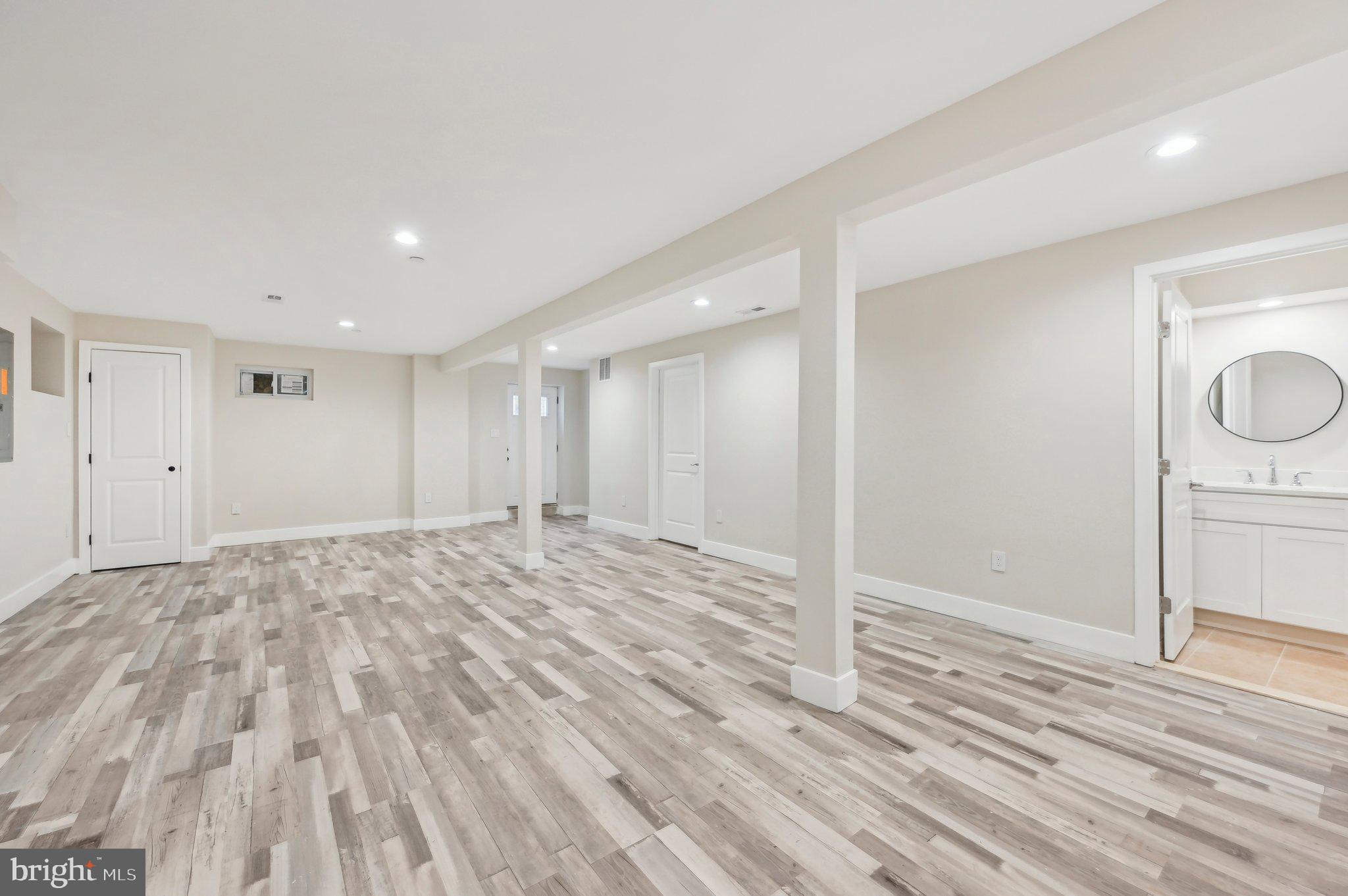 11990 Hall Shop Road Clarksville, MD 21029 - Photo 55 of 64 a view of empty room with wooden floor