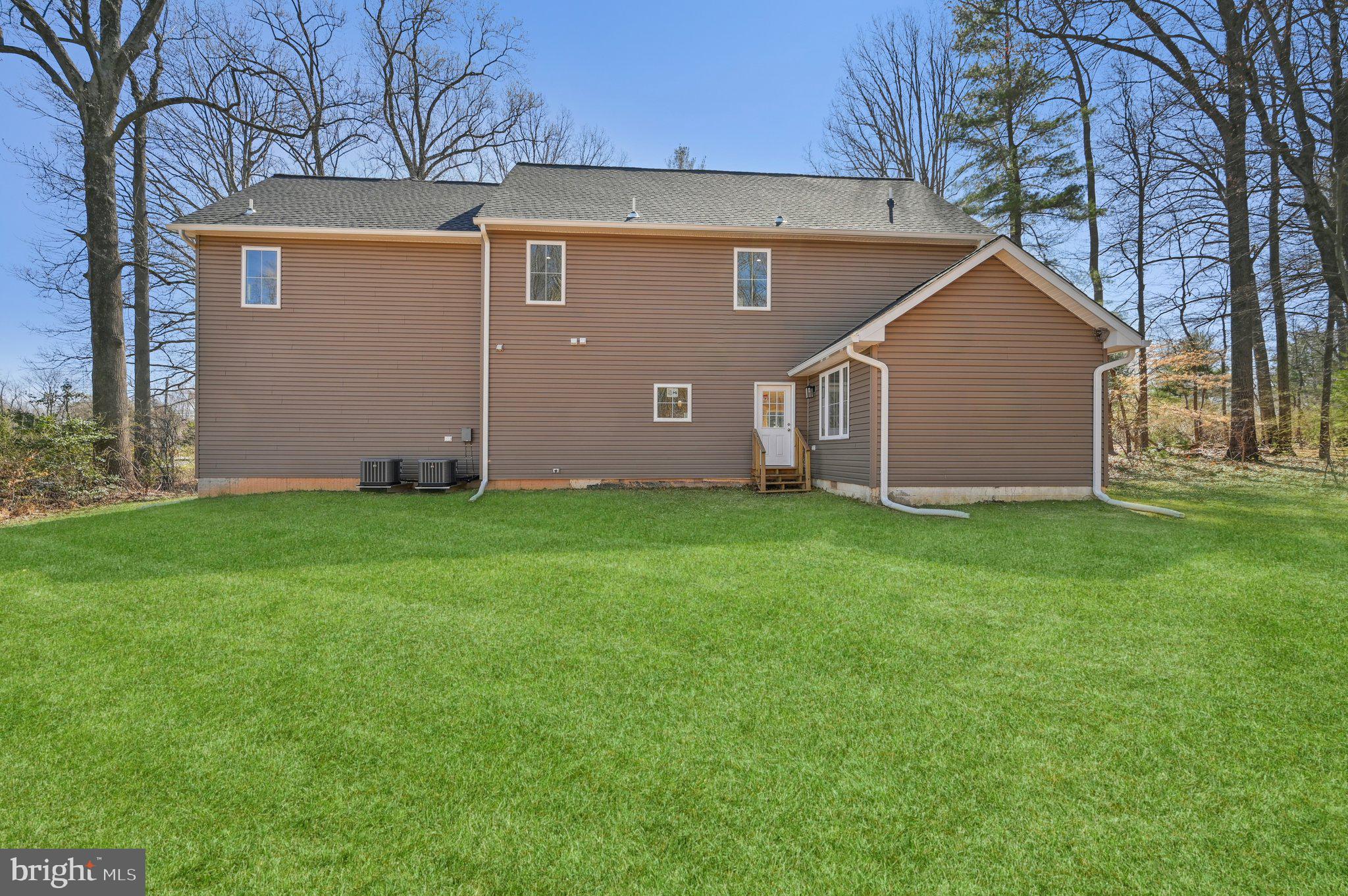 11990 Hall Shop Road Clarksville, MD 21029 - Photo 59 of 64 a view of a house with yard and a tree