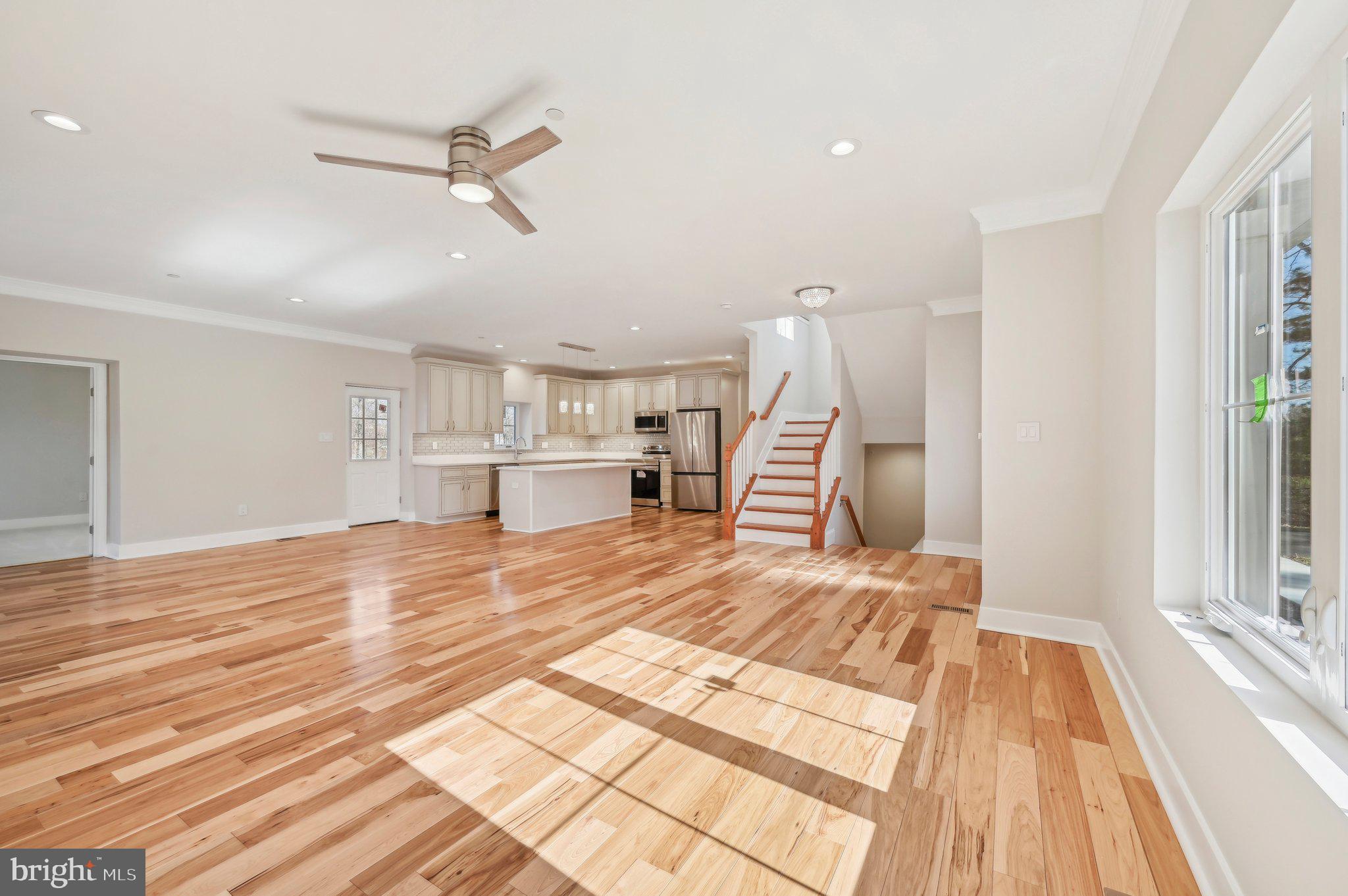 11990 Hall Shop Road Clarksville, MD 21029 - Photo 9 of 64 a view of empty room with wooden floor and window