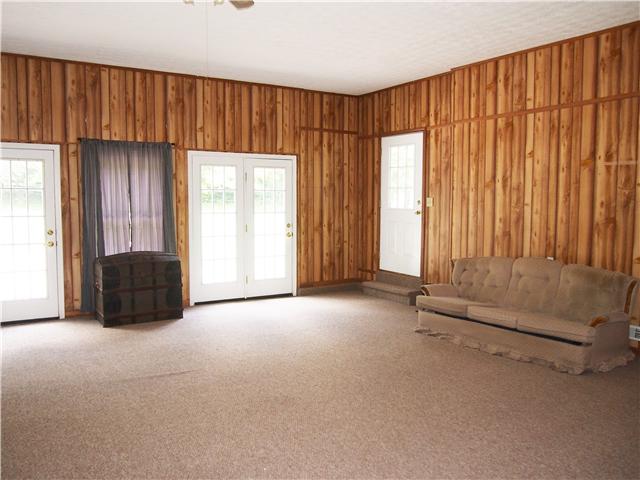3096 Dodson Gap Road Culleoka, TN 38451 - Photo 11 of 20 Bonus Room off the kitchen gives access to the 3 car garage and the utility room