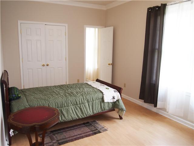3096 Dodson Gap Road Culleoka, TN 38451 - Photo 13 of 20 Second Bedroom upstairs also an in-suite bathroom with a shower/tub combo and good view of the front yard