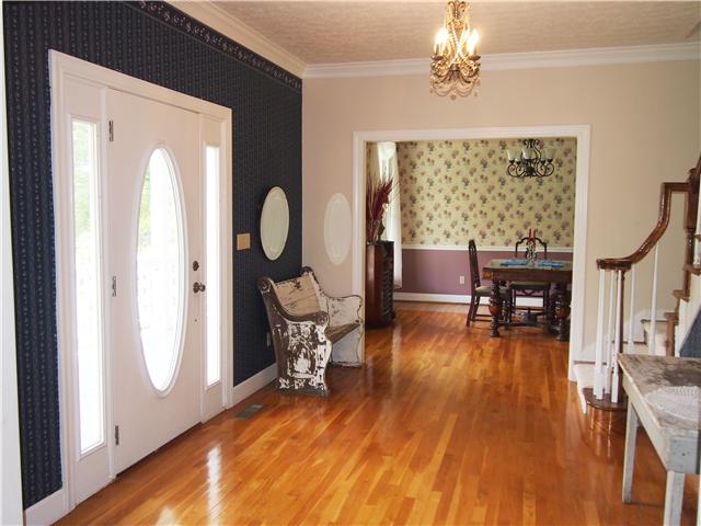 3096 Dodson Gap Road Culleoka, TN 38451 - Photo 20 of 20 Open entryway showcasing the open floor plan and sand/finished hardwood flooring