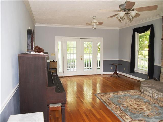 3096 Dodson Gap Road Culleoka, TN 38451 - Photo 5 of 20 Doors in the Living room open up to the porch and the backyard