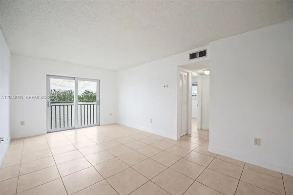 $307,000 | 9915 West Okeechobee Road, Unit 2403, Hialeah Gardens, FL 33016