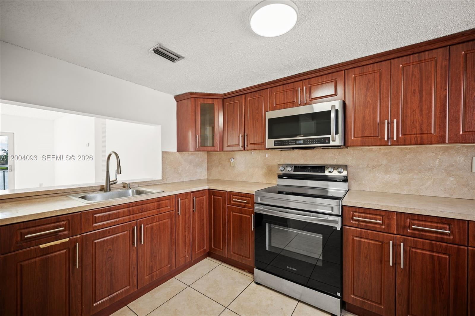 9915 West Okeechobee Road, Unit 2403 Hialeah Gardens, FL 33016 - Photo 5 of 46