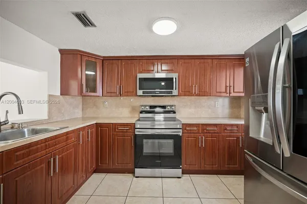 $307,000 | 9915 West Okeechobee Road, Unit 2403, Hialeah Gardens, FL 33016