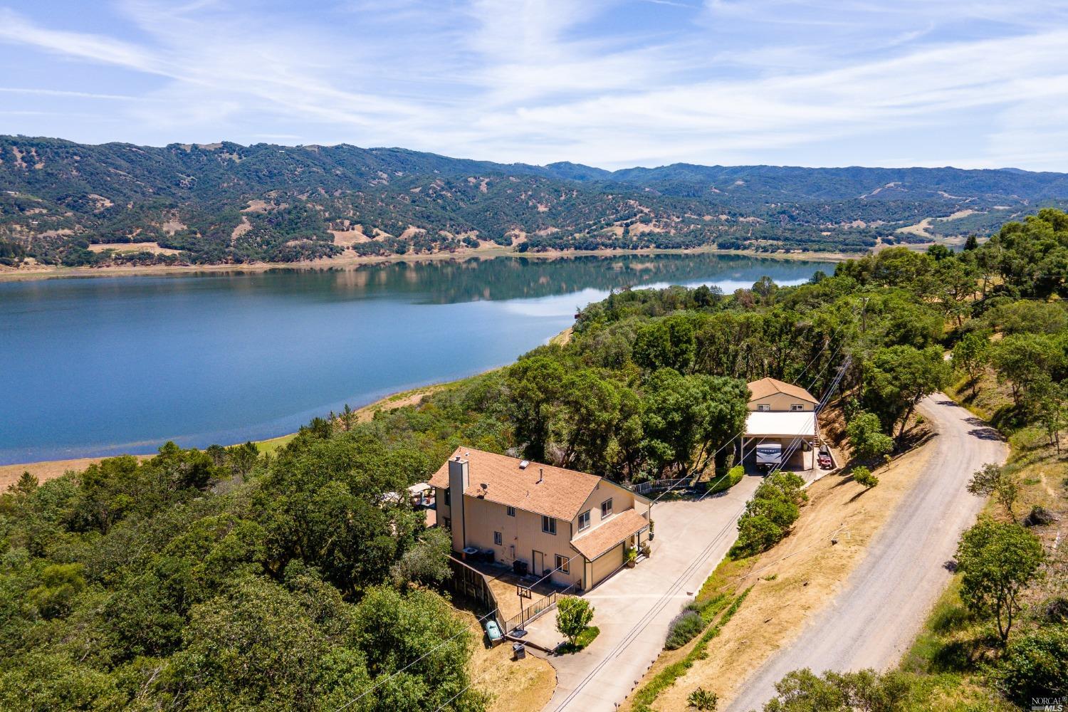 5501 Lake Ridge Road Ukiah, CA 95482 - Photo 1 of 1 an aerial view of a house with a lake view