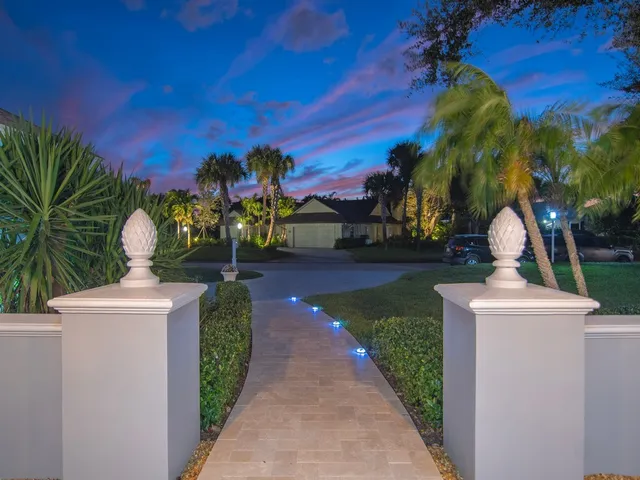 a view of a garden with a fountain
