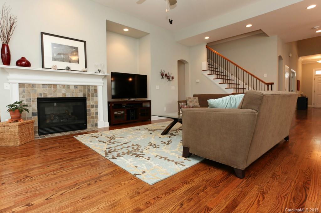 671 Revival Row Fort Mill, SC 29708 - Photo 11 of 24 a living room with furniture and a fireplace