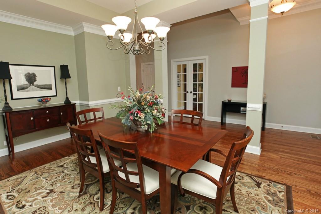 671 Revival Row Fort Mill, SC 29708 - Photo 3 of 24 a dining room with furniture and chandelier