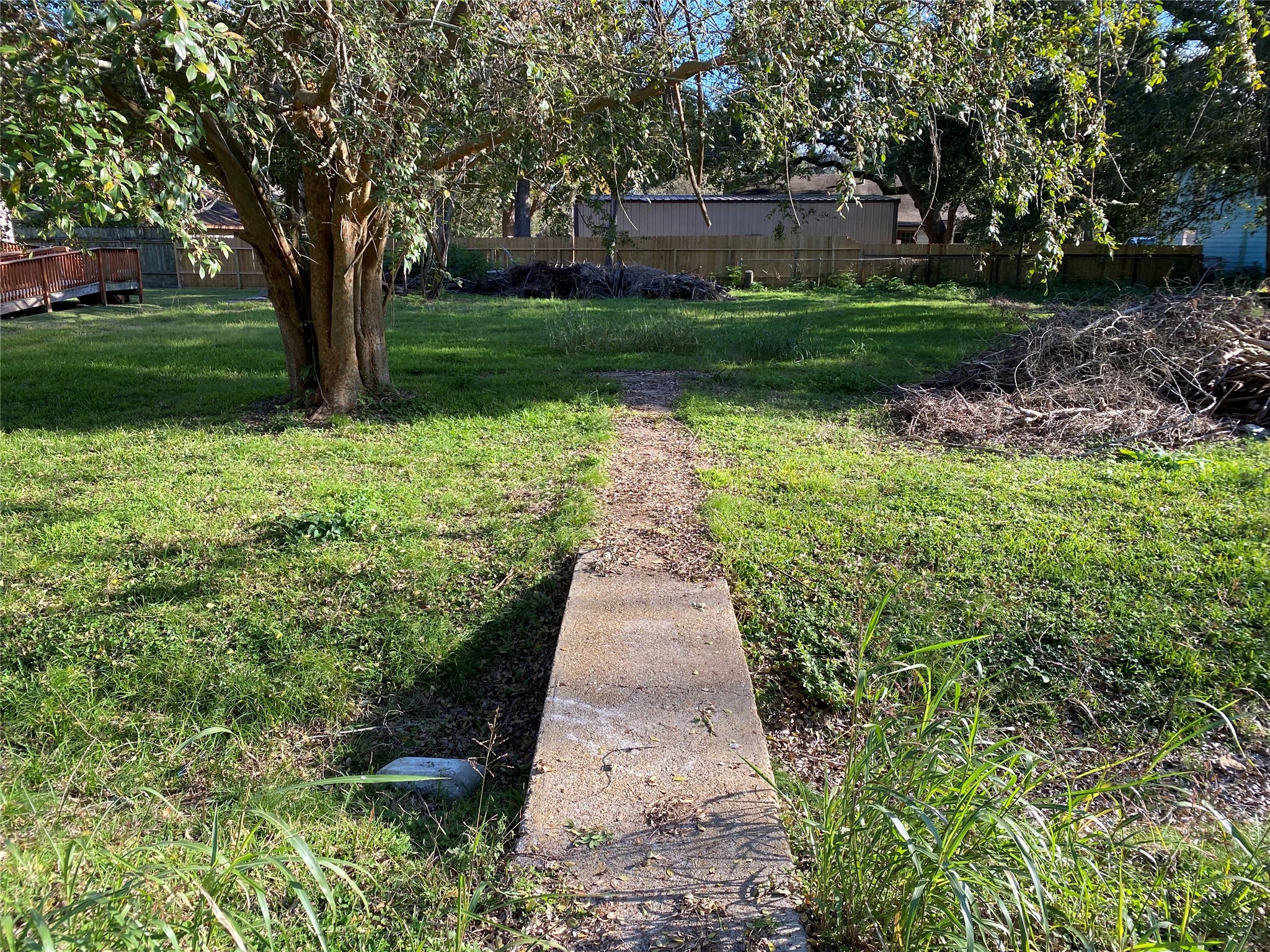 913 Chestnut Street La Marque, TX 77568 - Photo 5 of 6 a view of a pathway with a yard