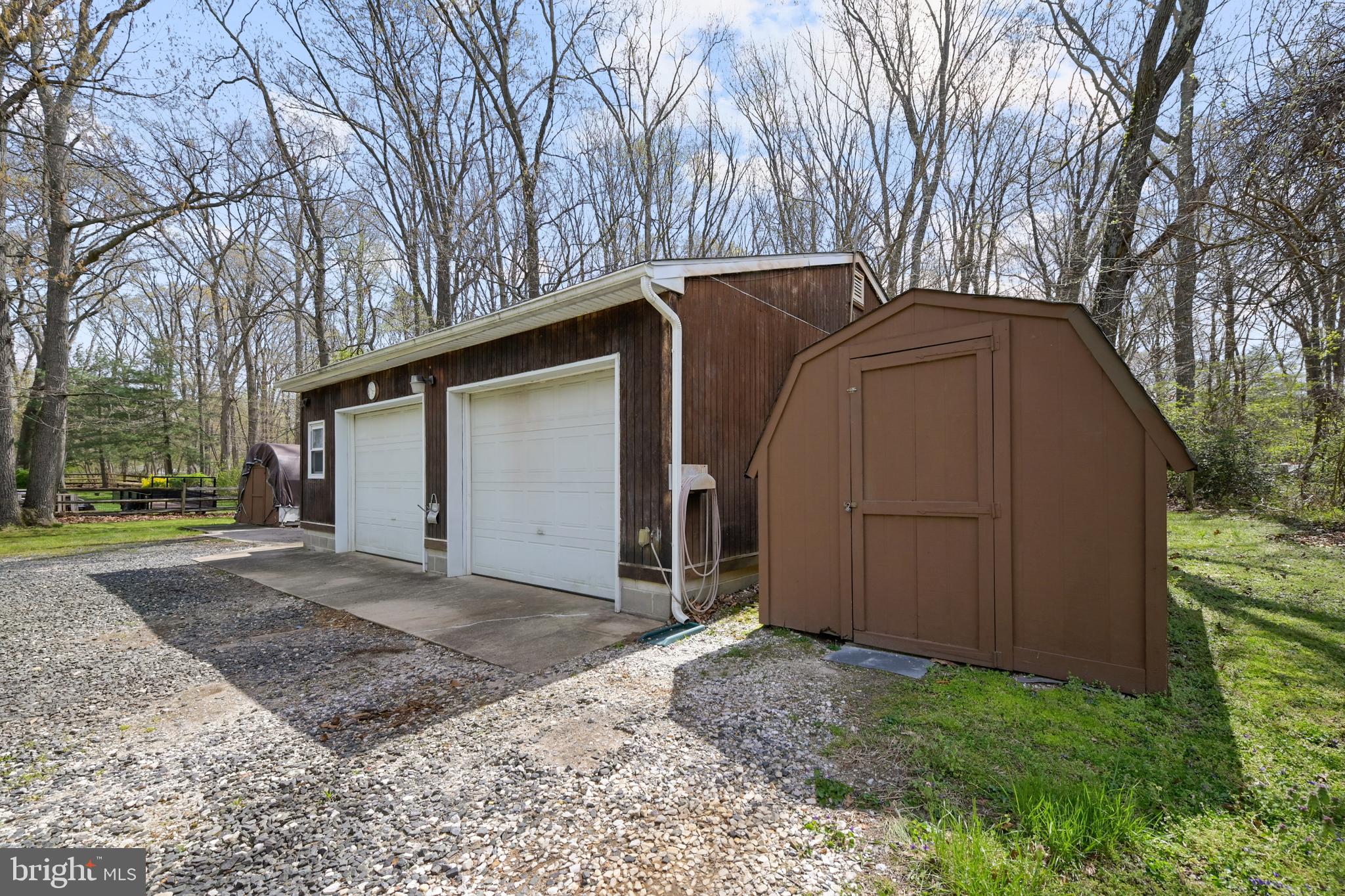 8437 Alvin Road Pasadena, MD 21122 - Photo 36 of 39 Garage with electric plus 3 sheds.